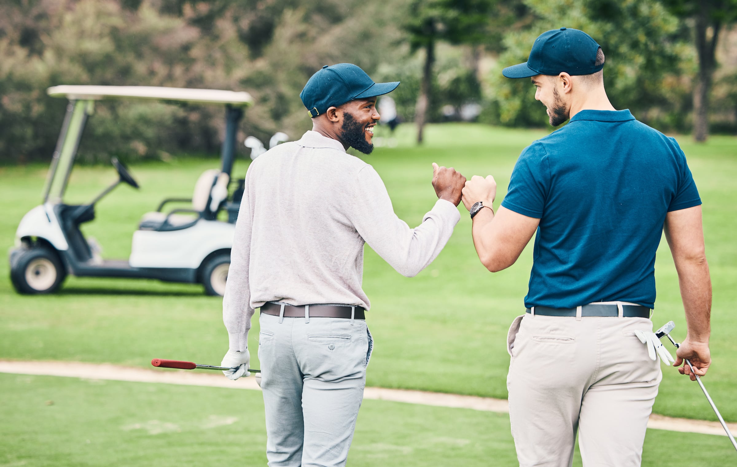 Two guys playing golf.