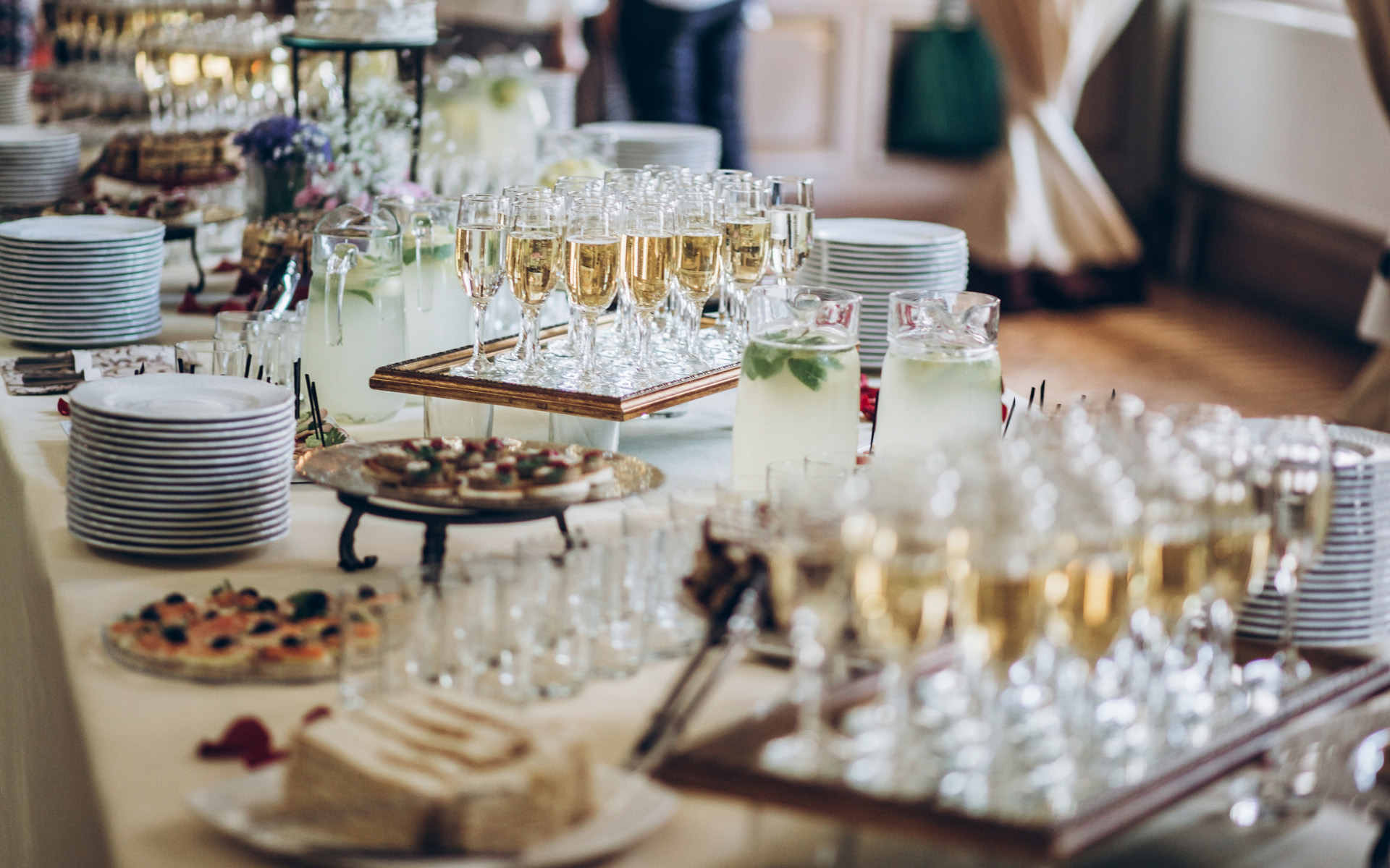 Wedding table setting with drinks and small bites