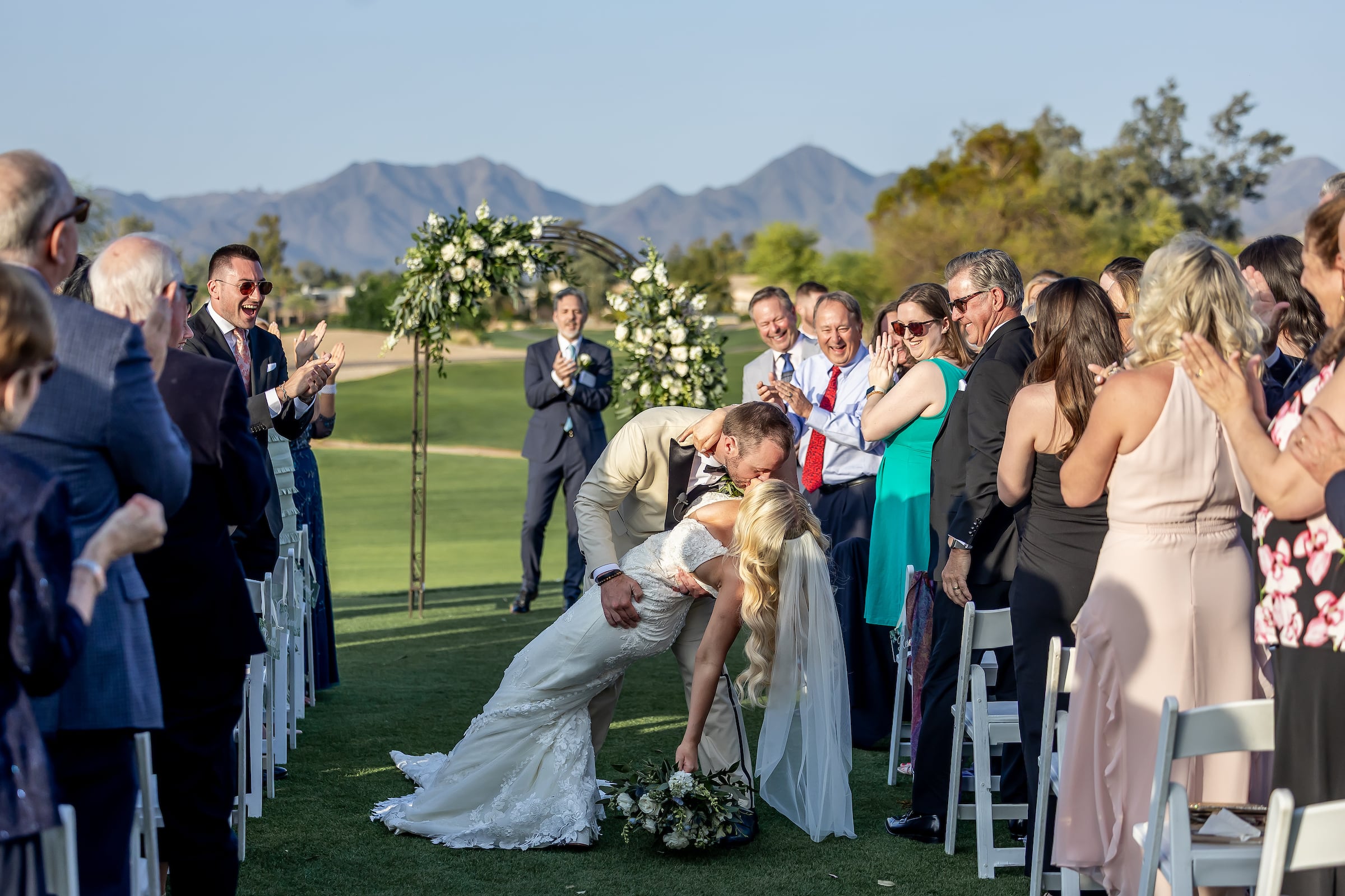Bride and groom kissing