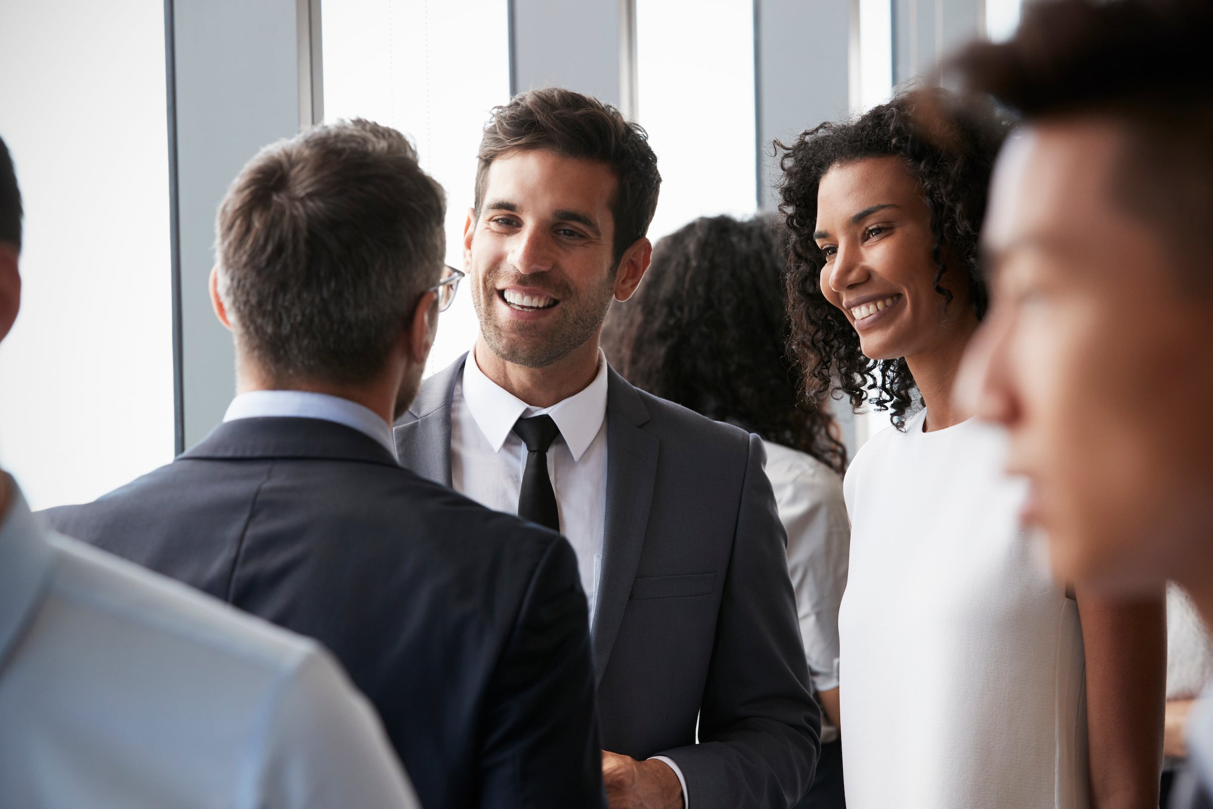 Men & Women at a Private Networking Event