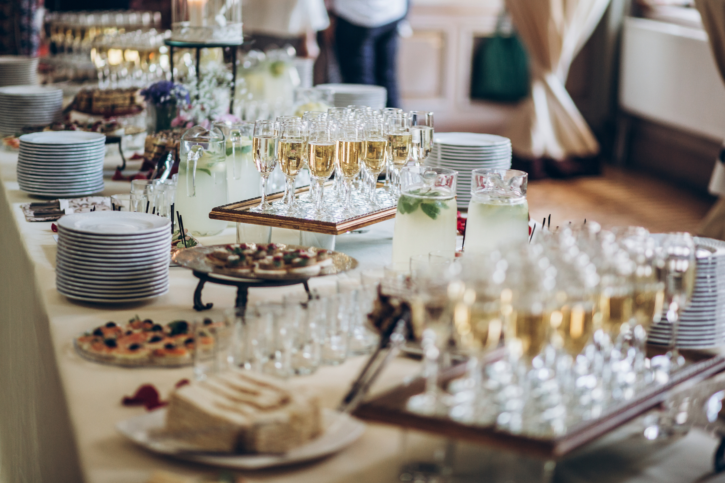 Private Event Table Set Up with Desserts & glasses of Champagne