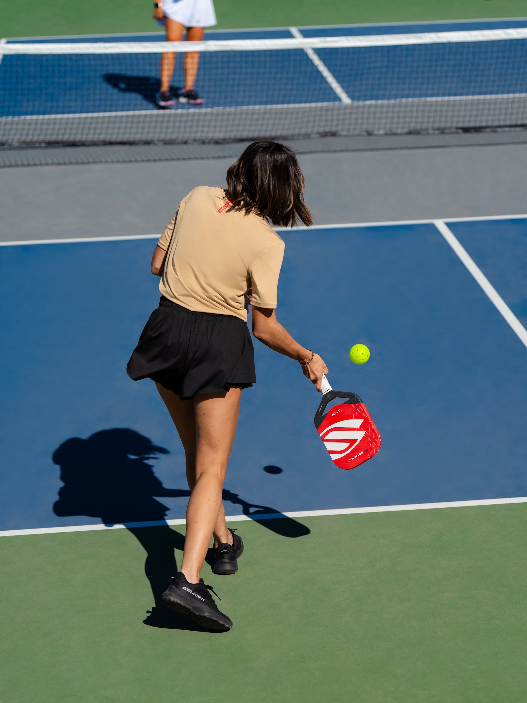 Woman Playing pickleball