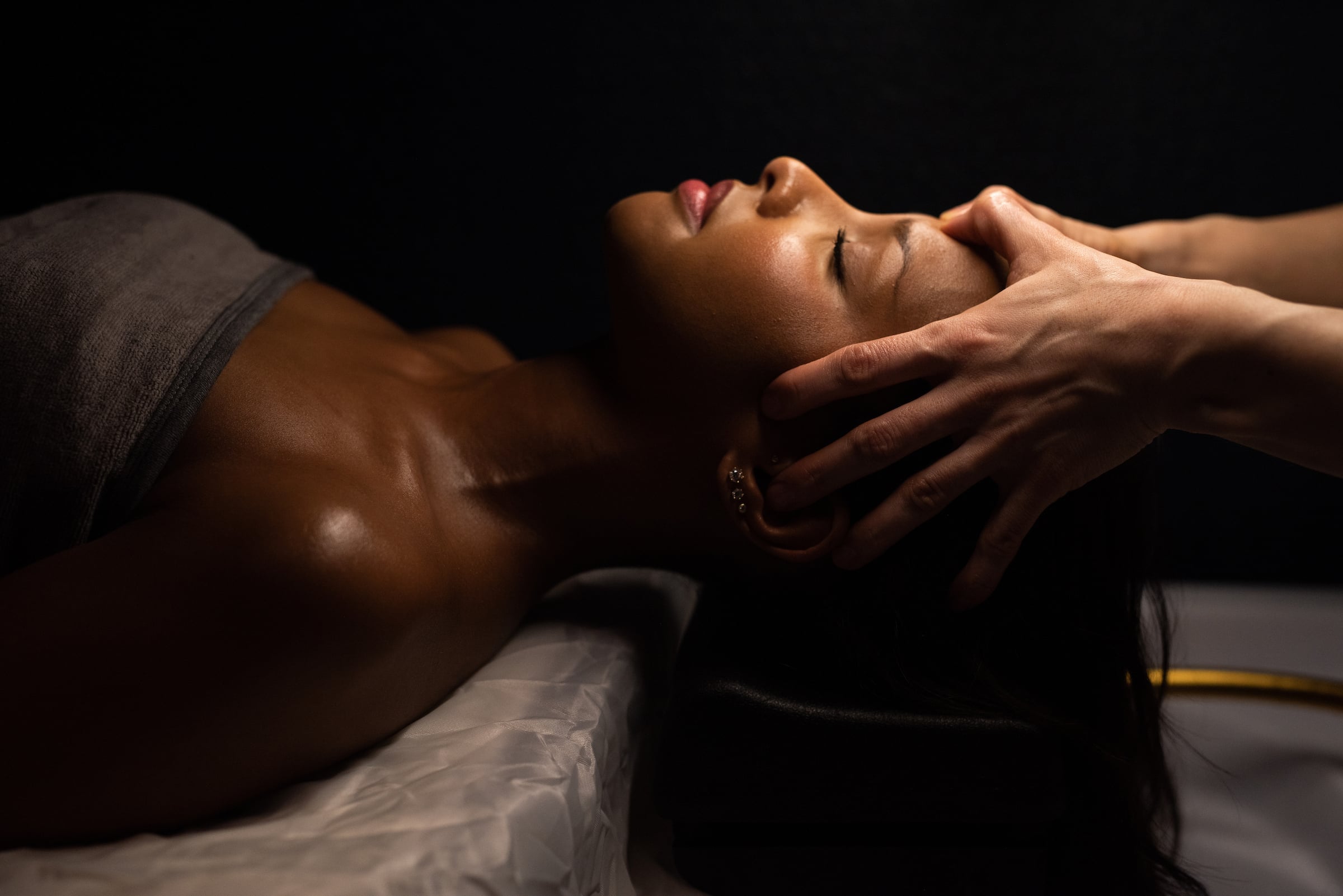 Black woman on a massage table