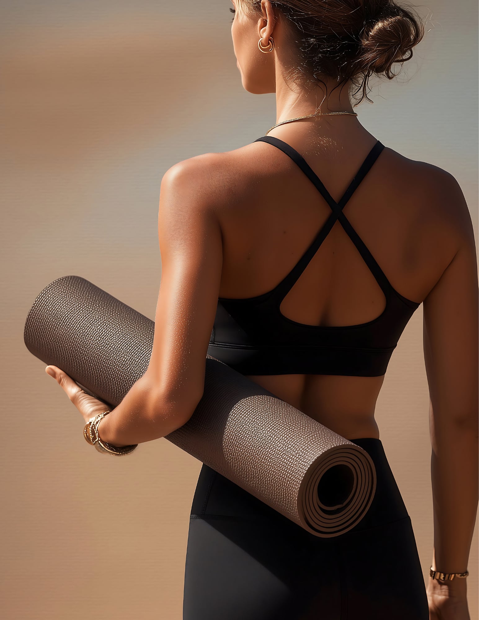 Woman with yoga mat