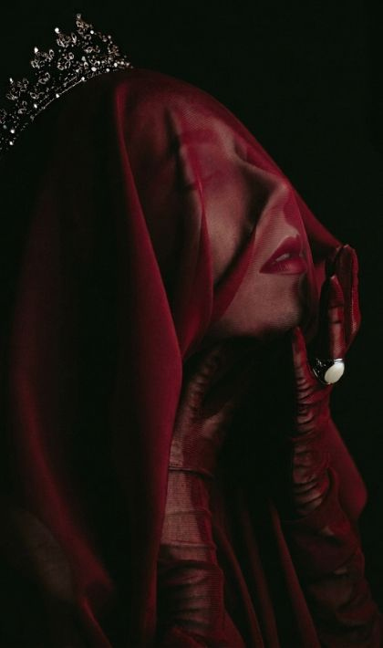 woman with red veil