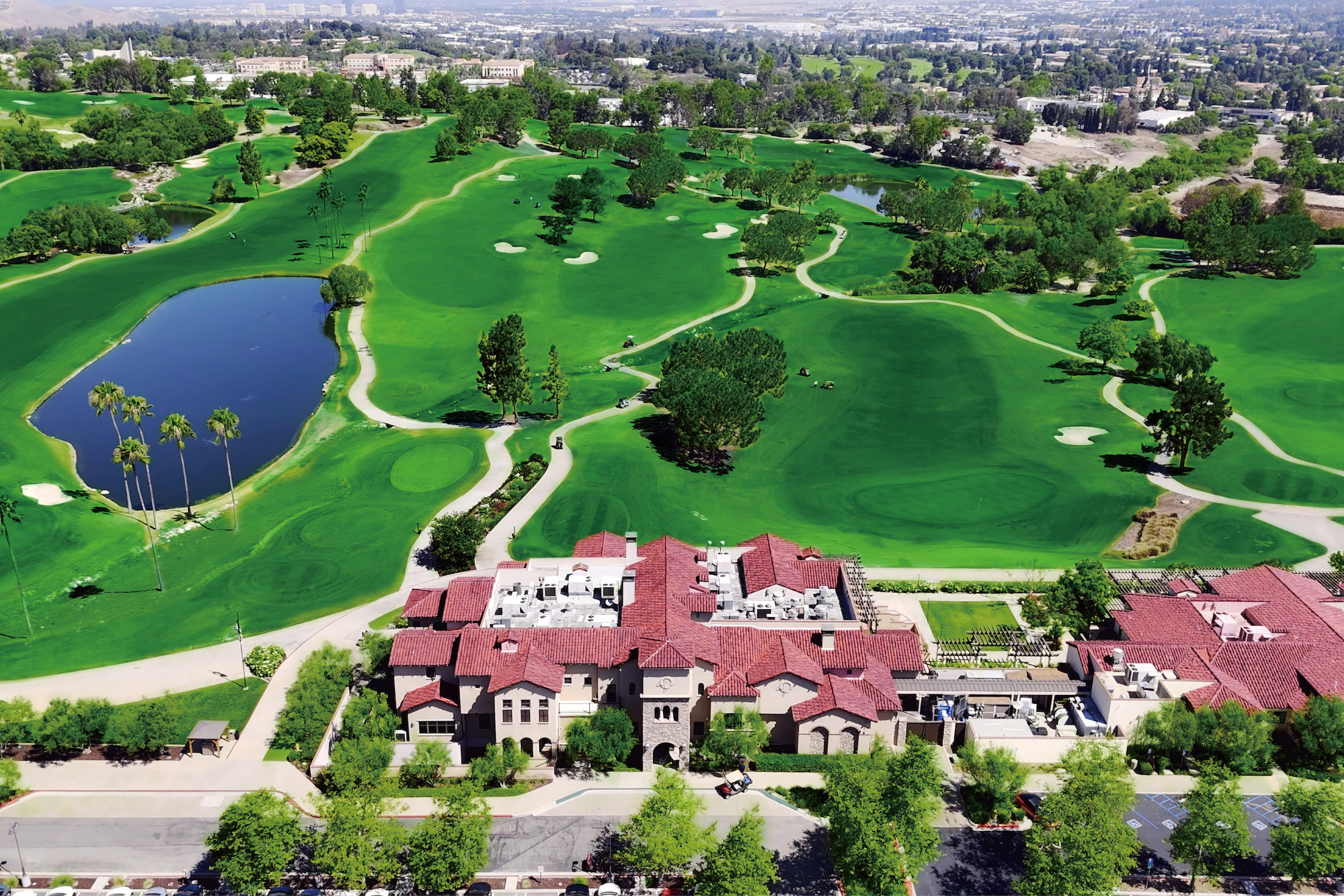aerial view of a clubhouse and golf course