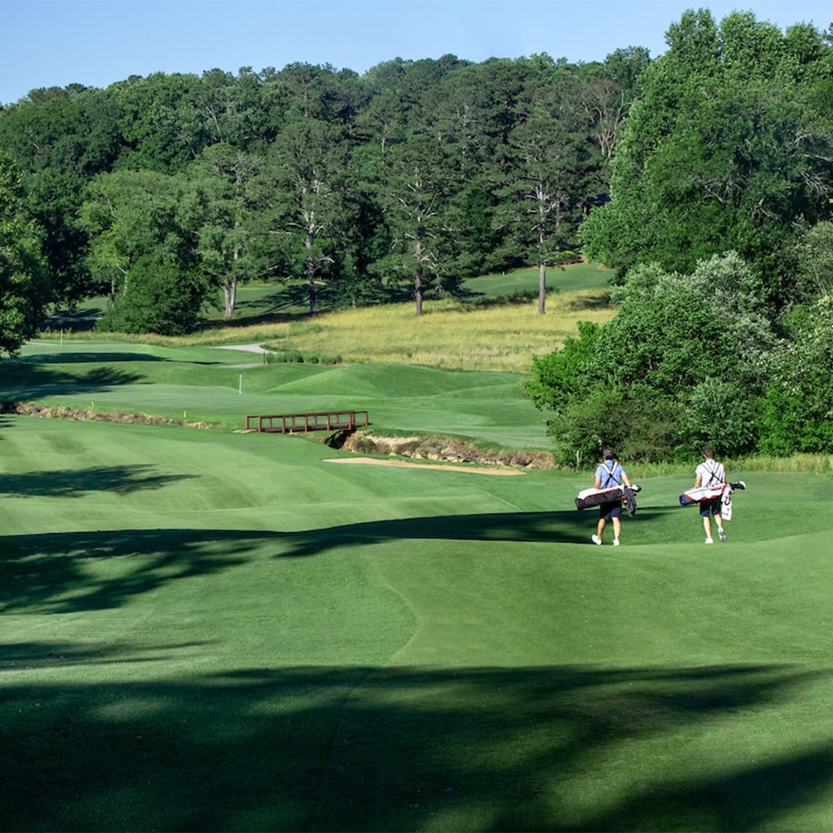 Atlanta National Golf Club Golf Course with 2 golfers walking