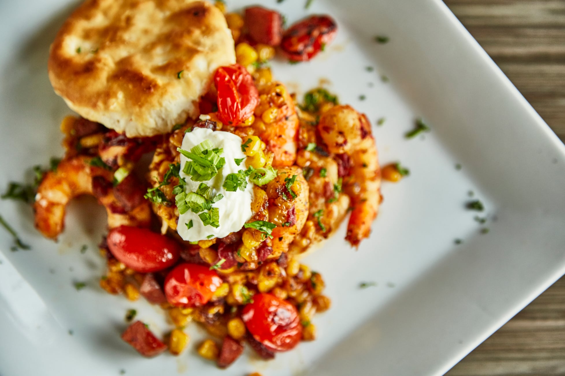 Plate of shrimp, corn, and biscuits