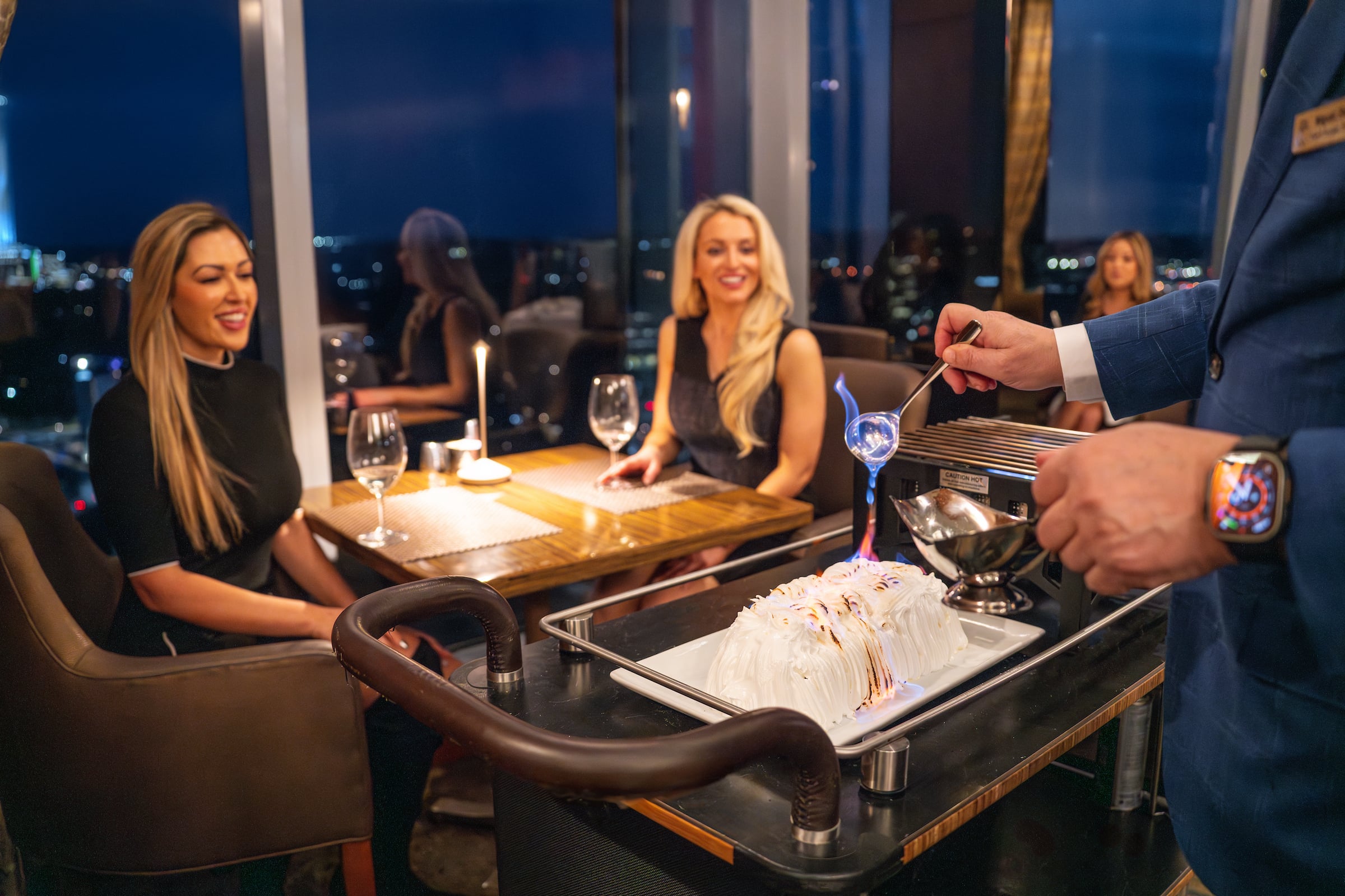Women enjoying tableside dessert