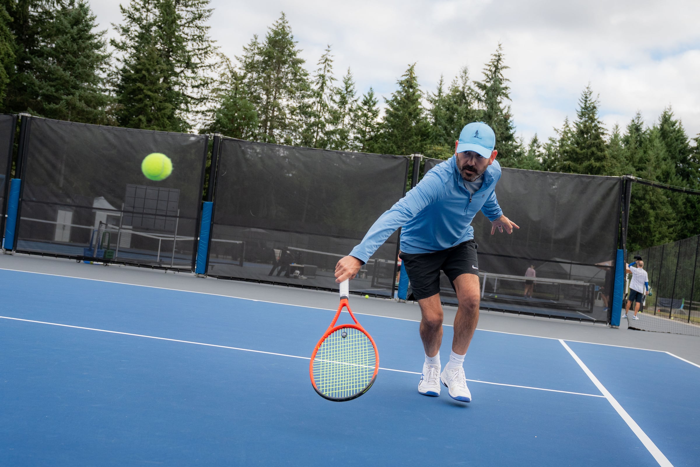 Man on tennis court