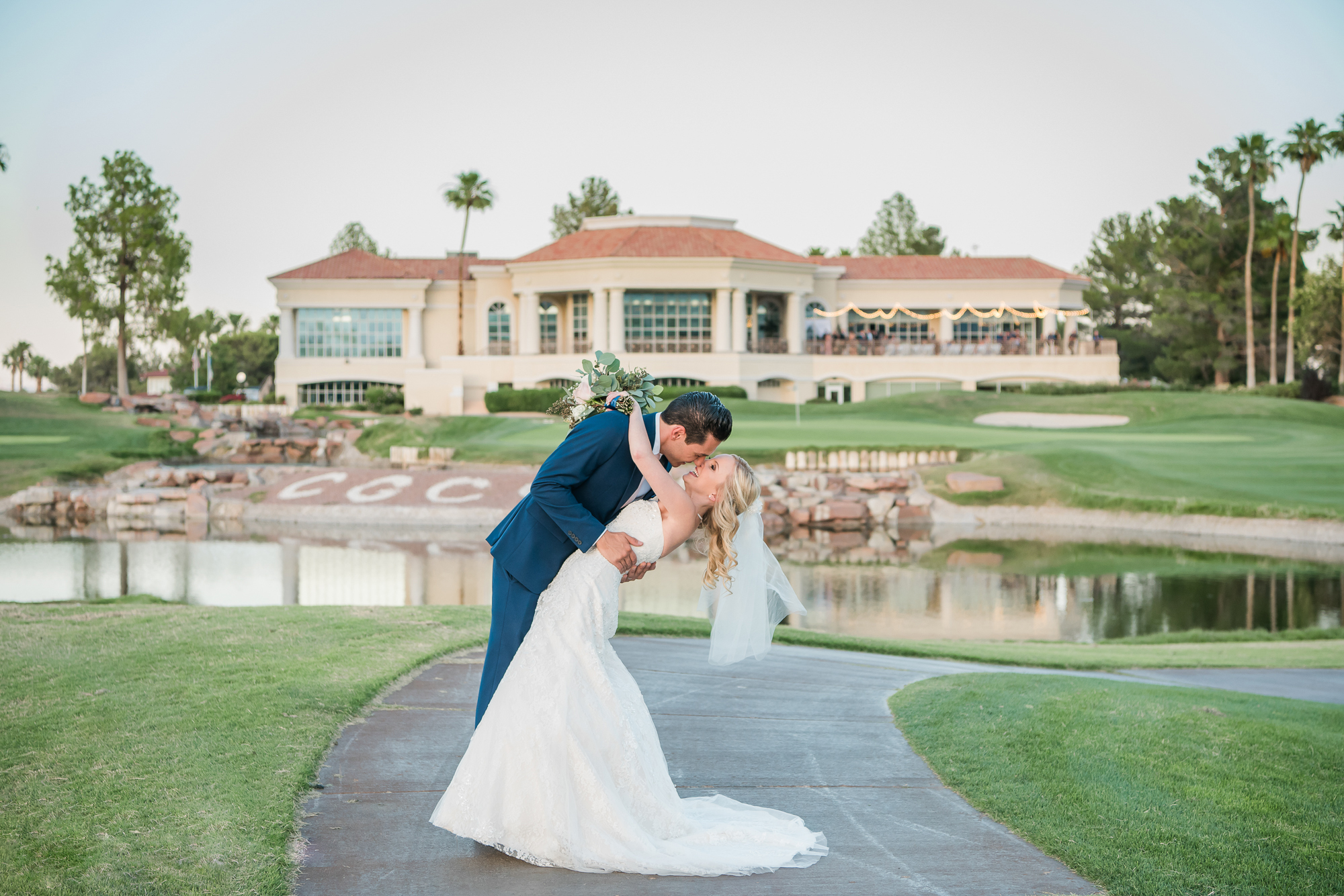Canyon Gate Country Club Wedding - Bride & Groom Kissing on course