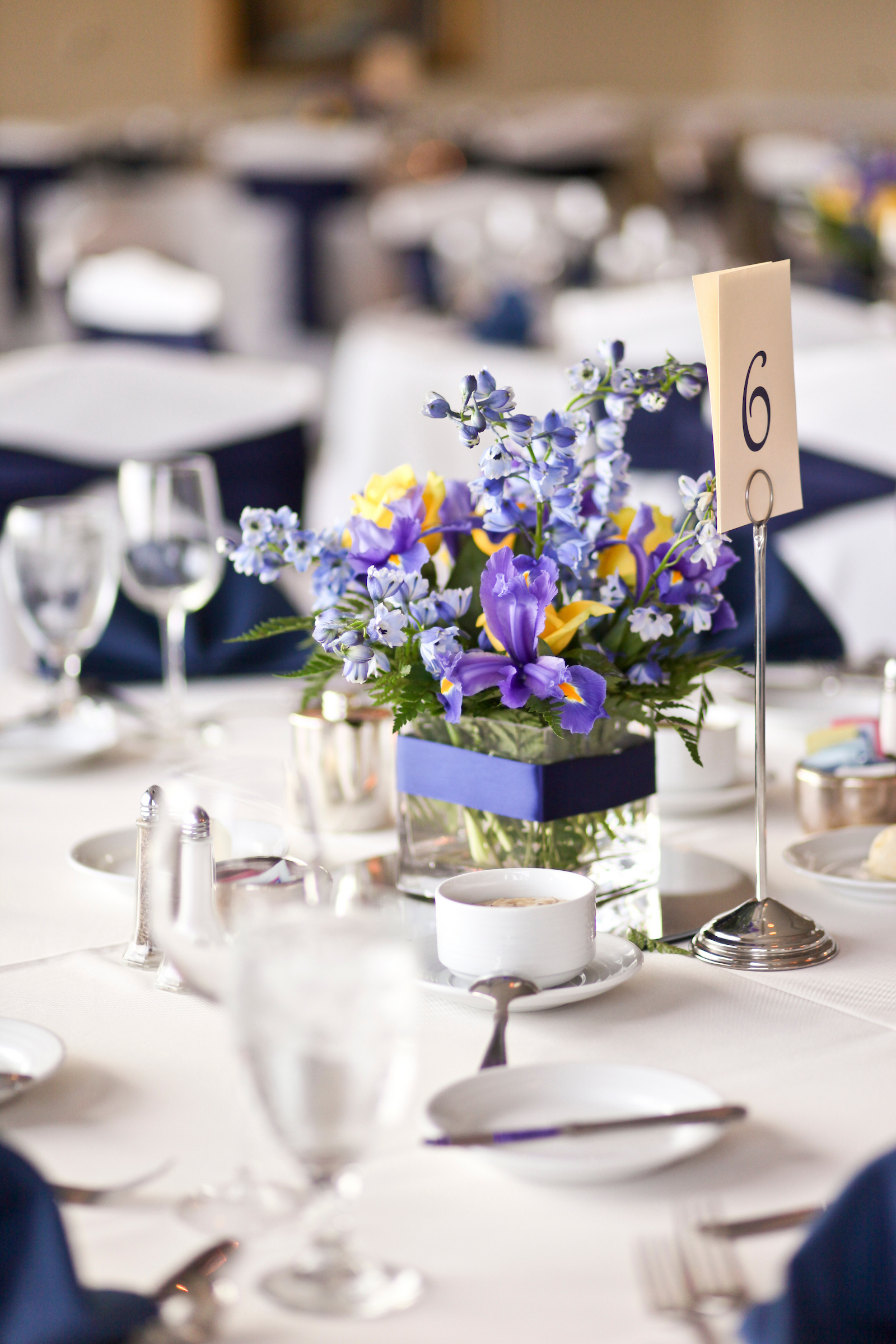 Private event table setting with a small floral arrangement