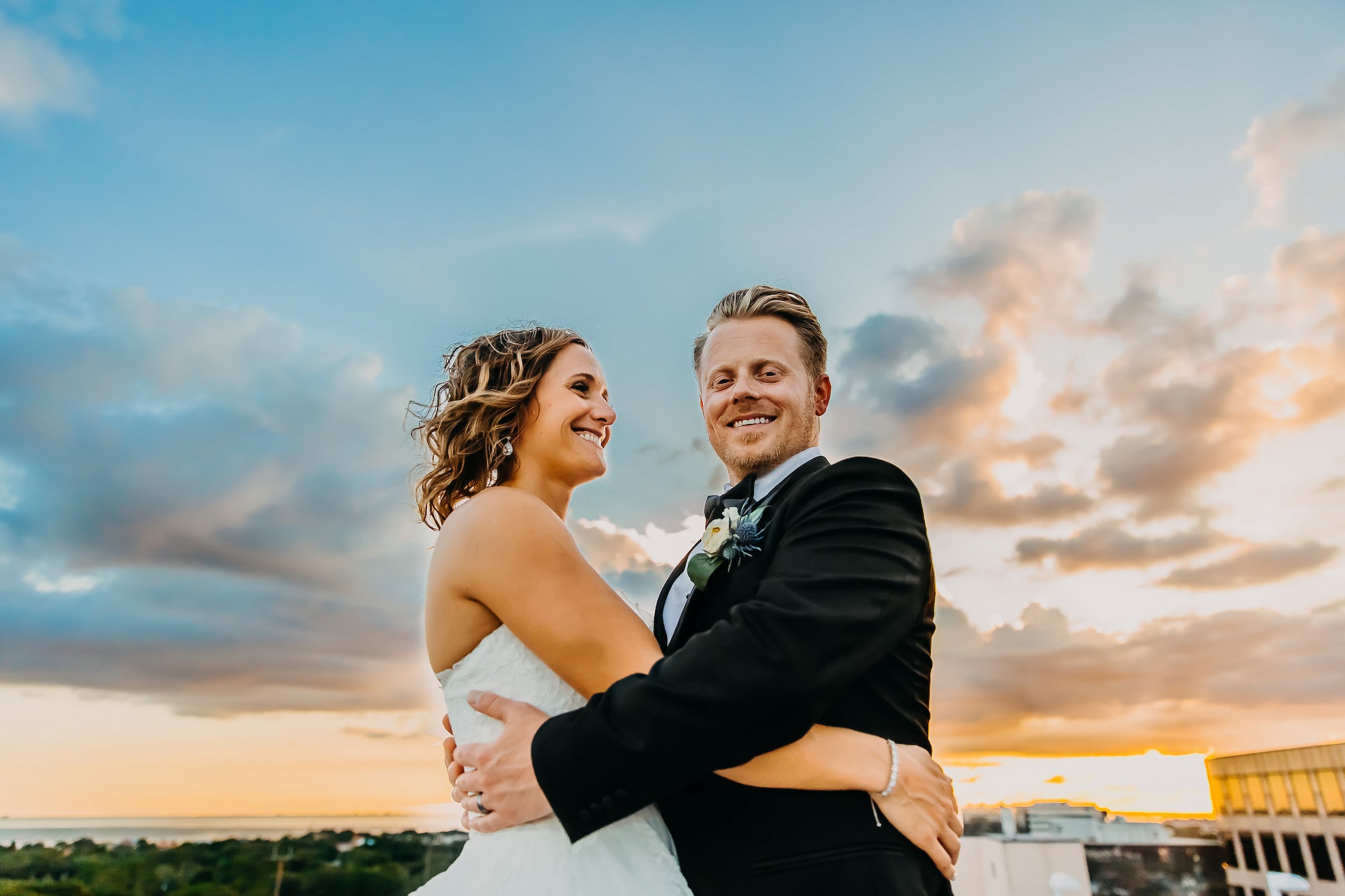 Bride & Groom hugging & smiling