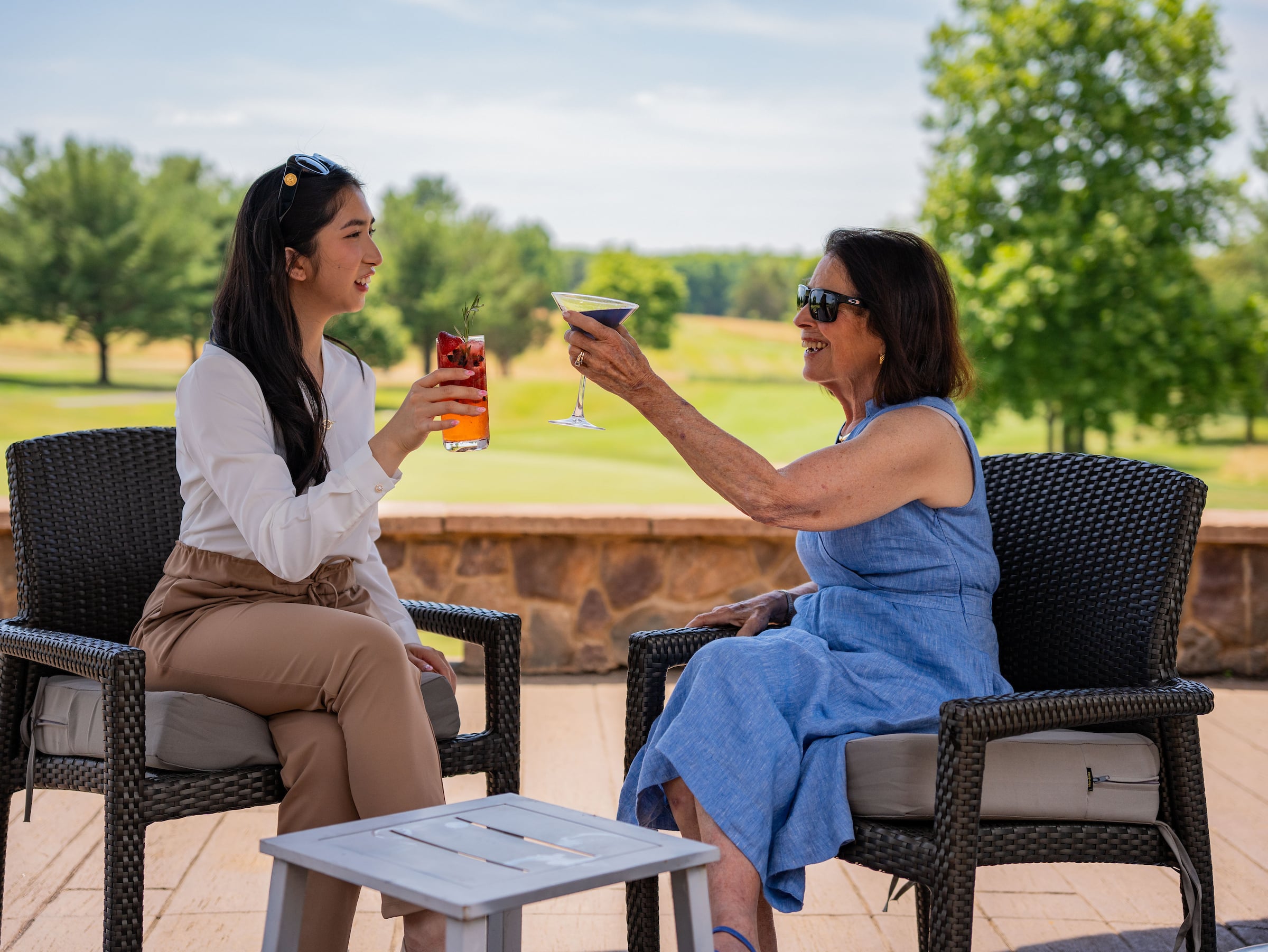 Women having cocktail outside