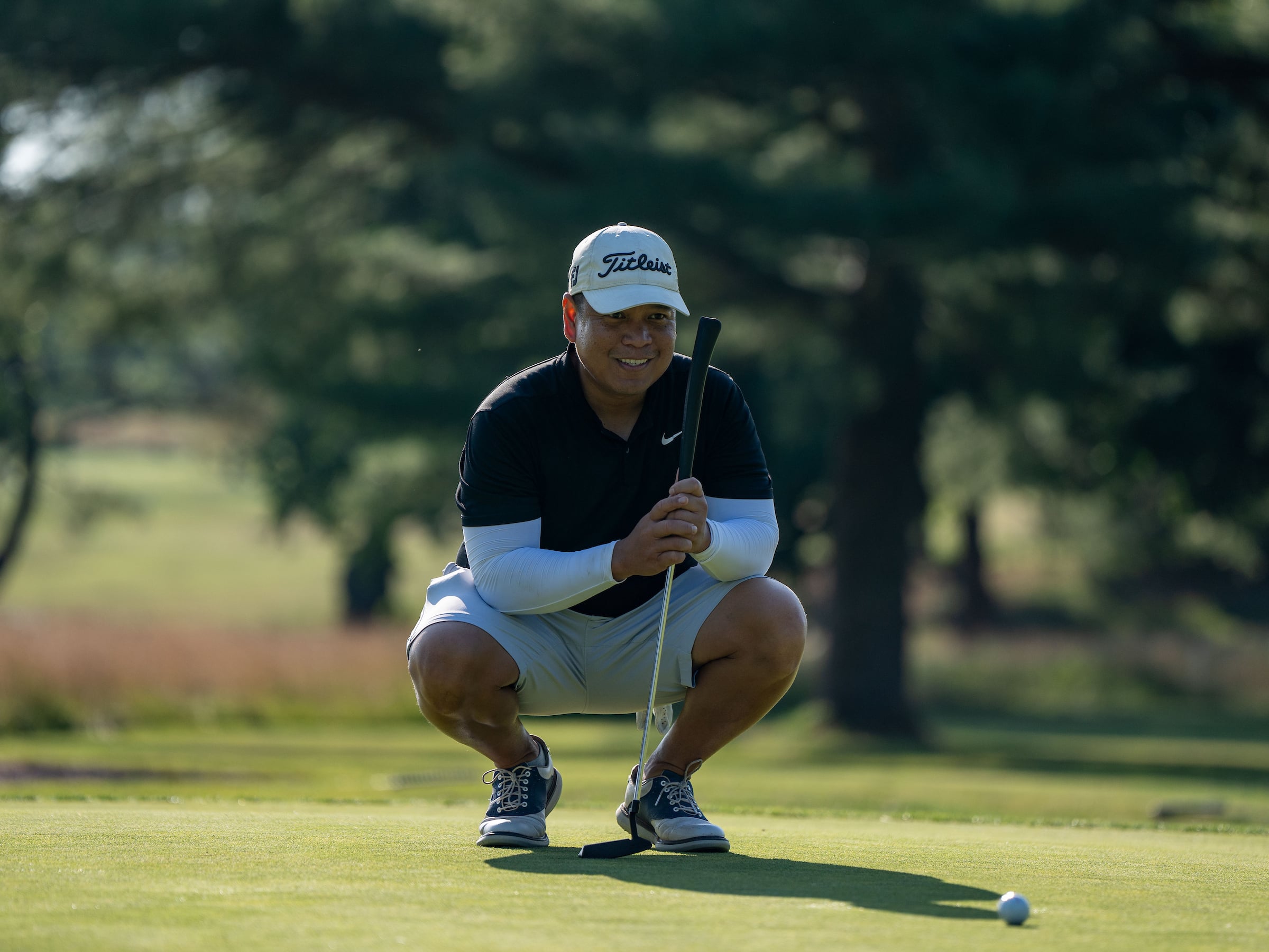 Golfer sqatting