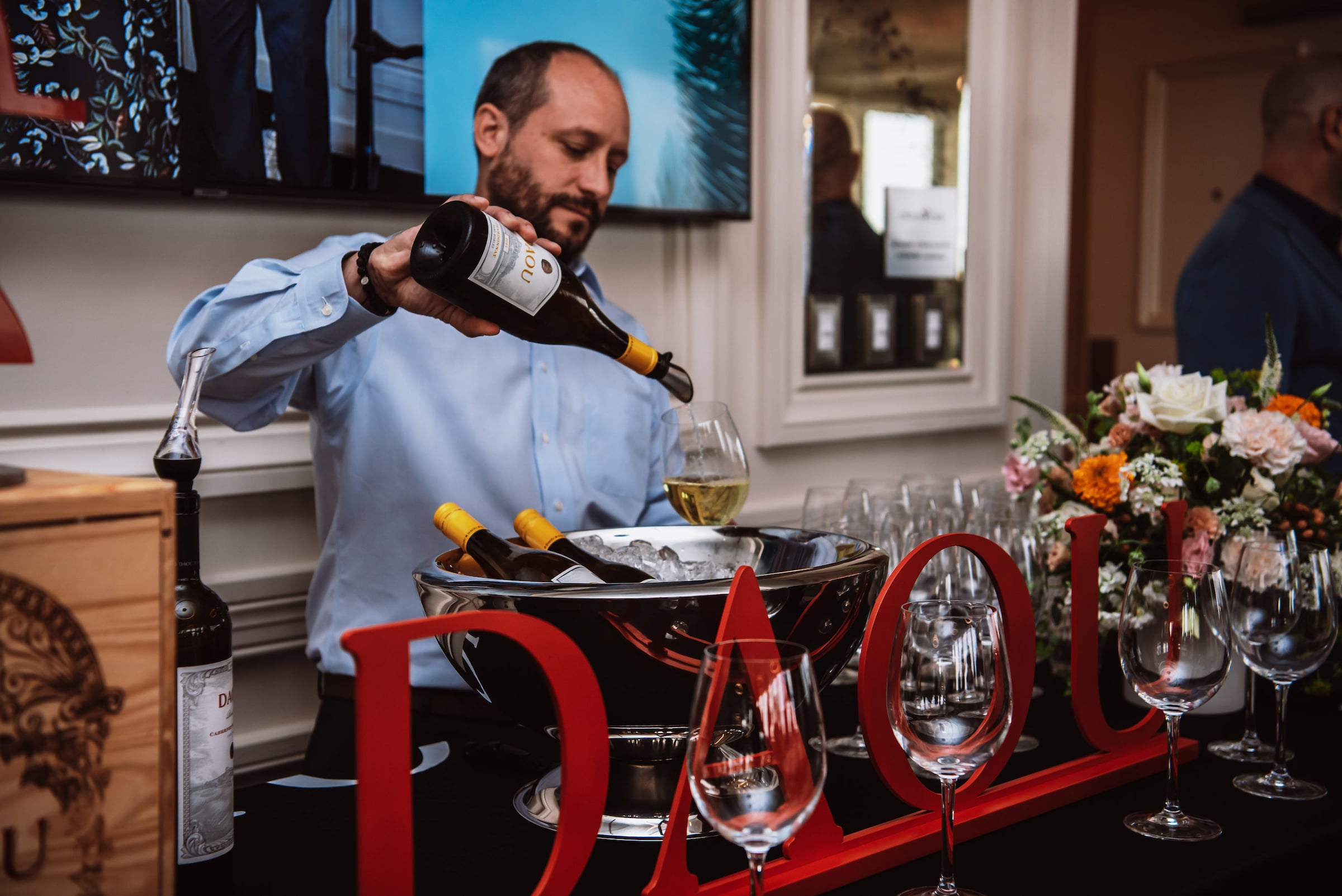Bartender pouring Daou wine at a private event