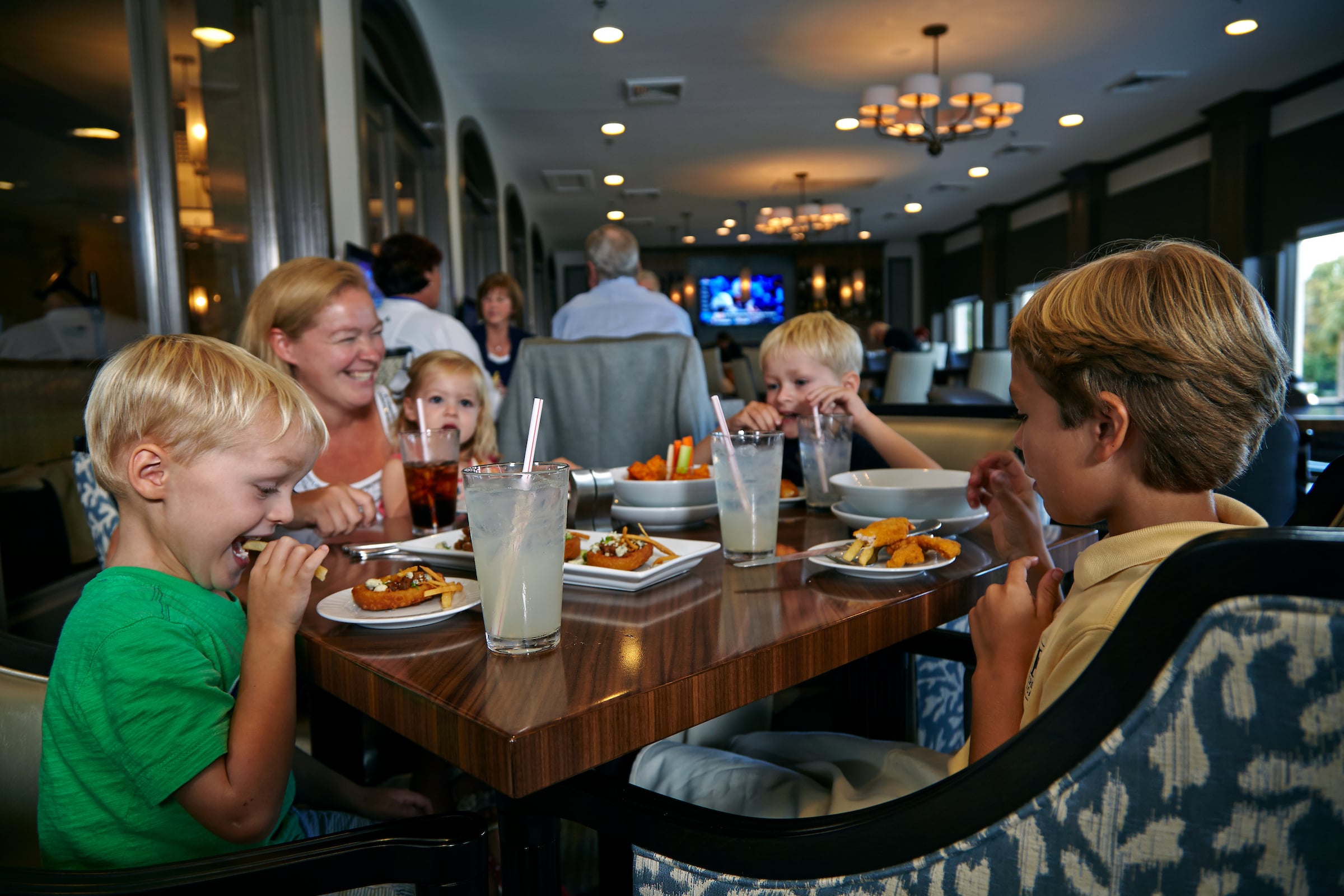 Mother dining with her children