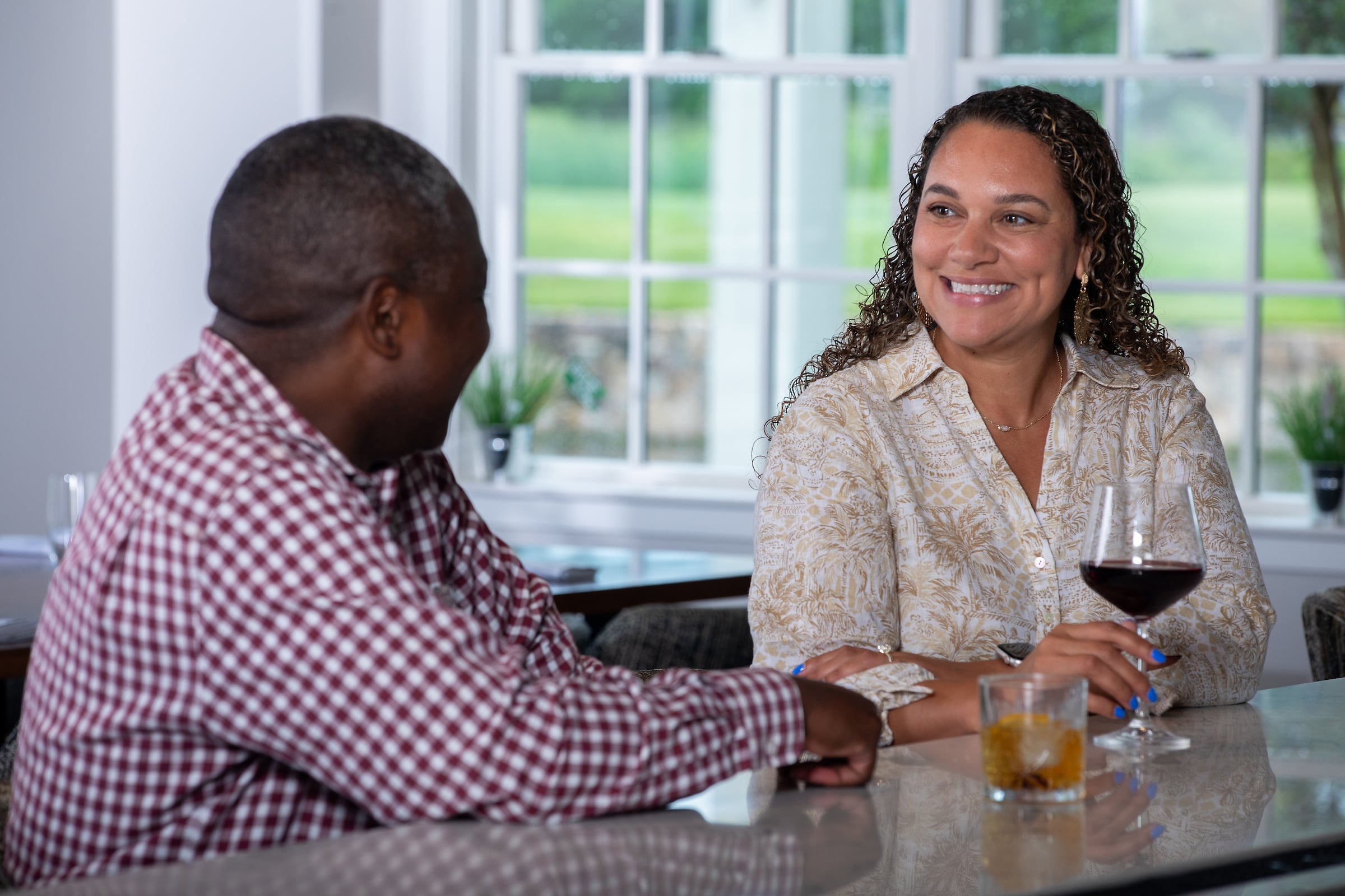 Man and woman sitting at a bar