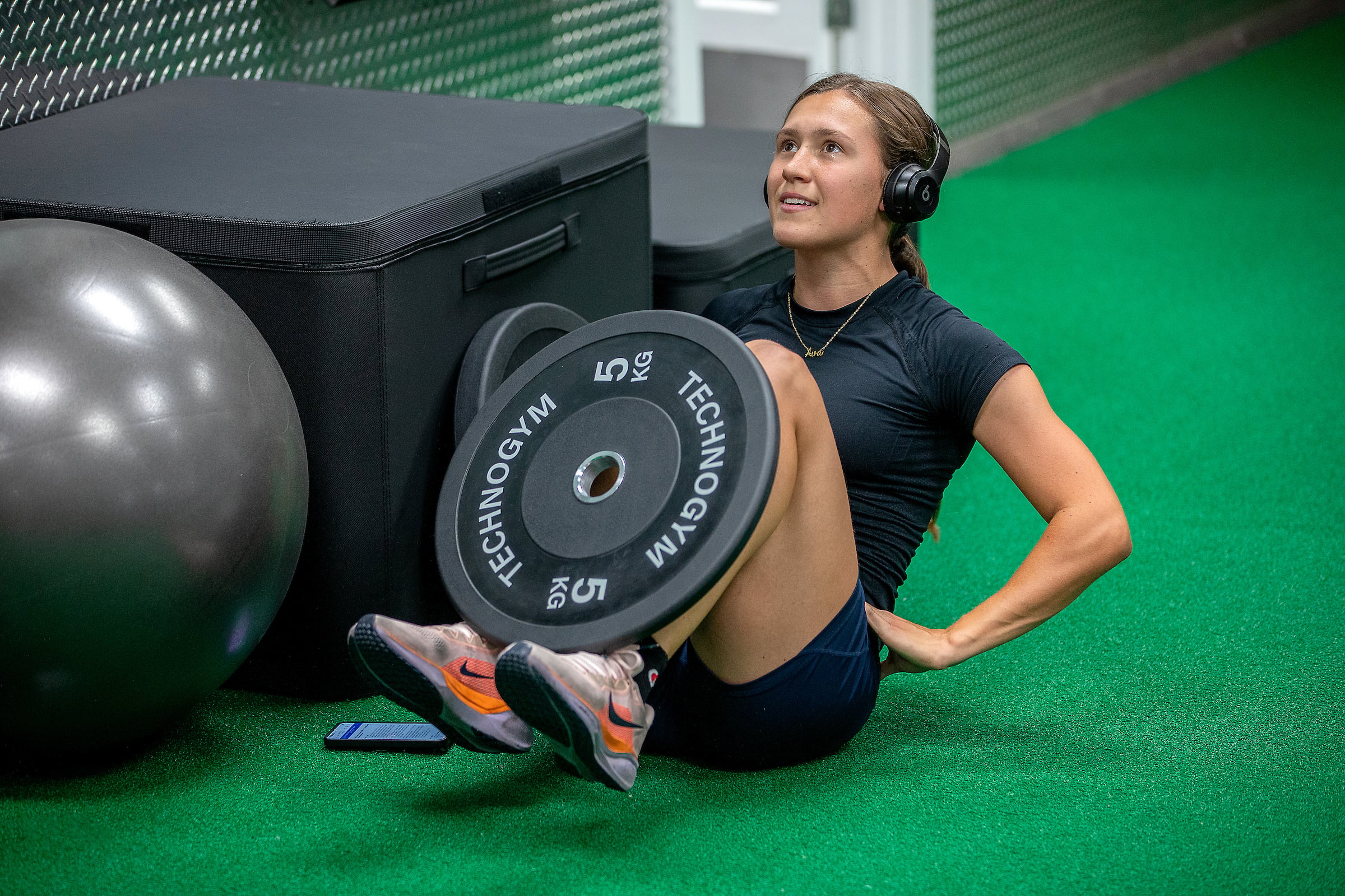 teen working out in the gym