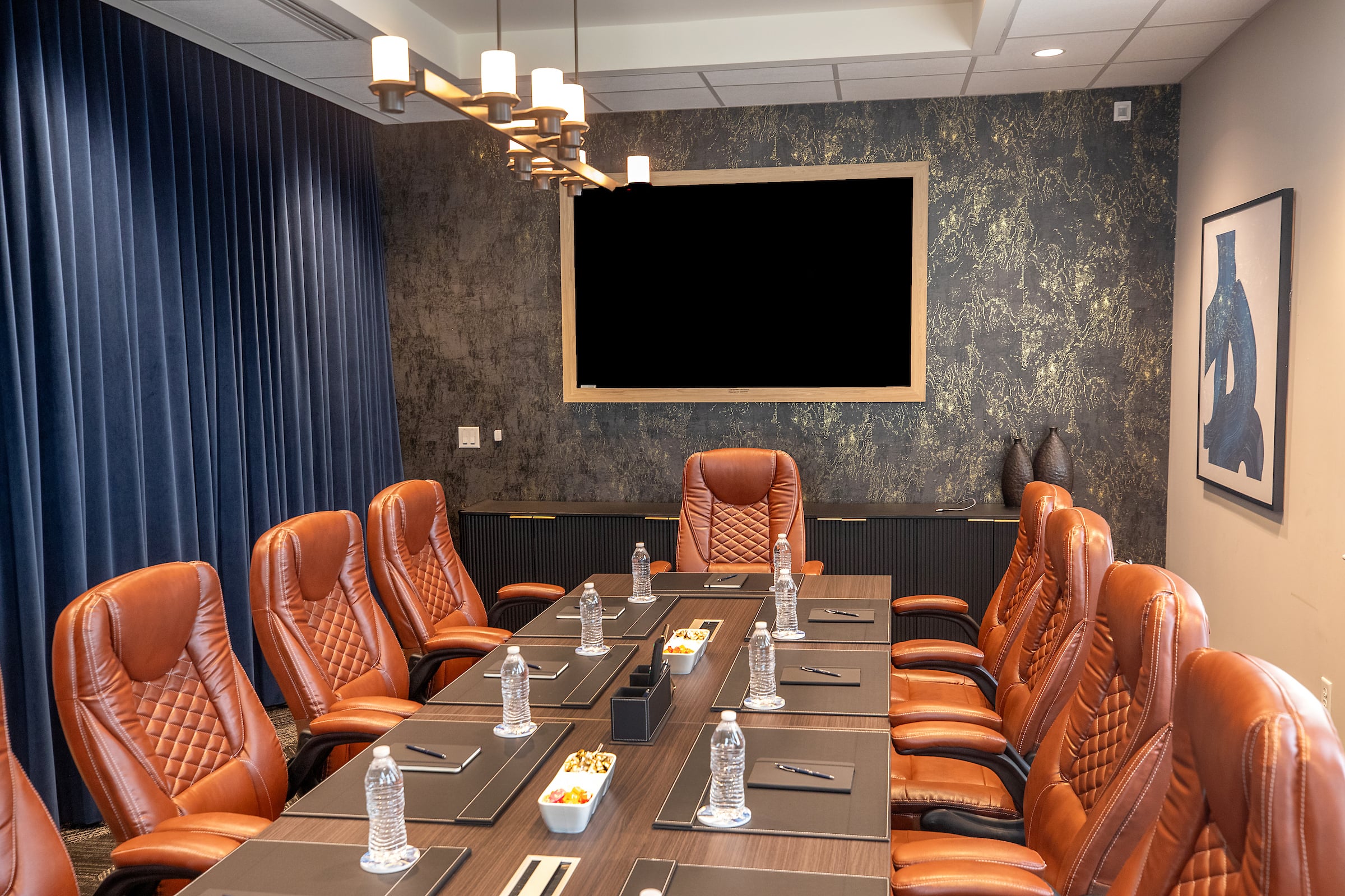 table and chairs set up for a meeting
