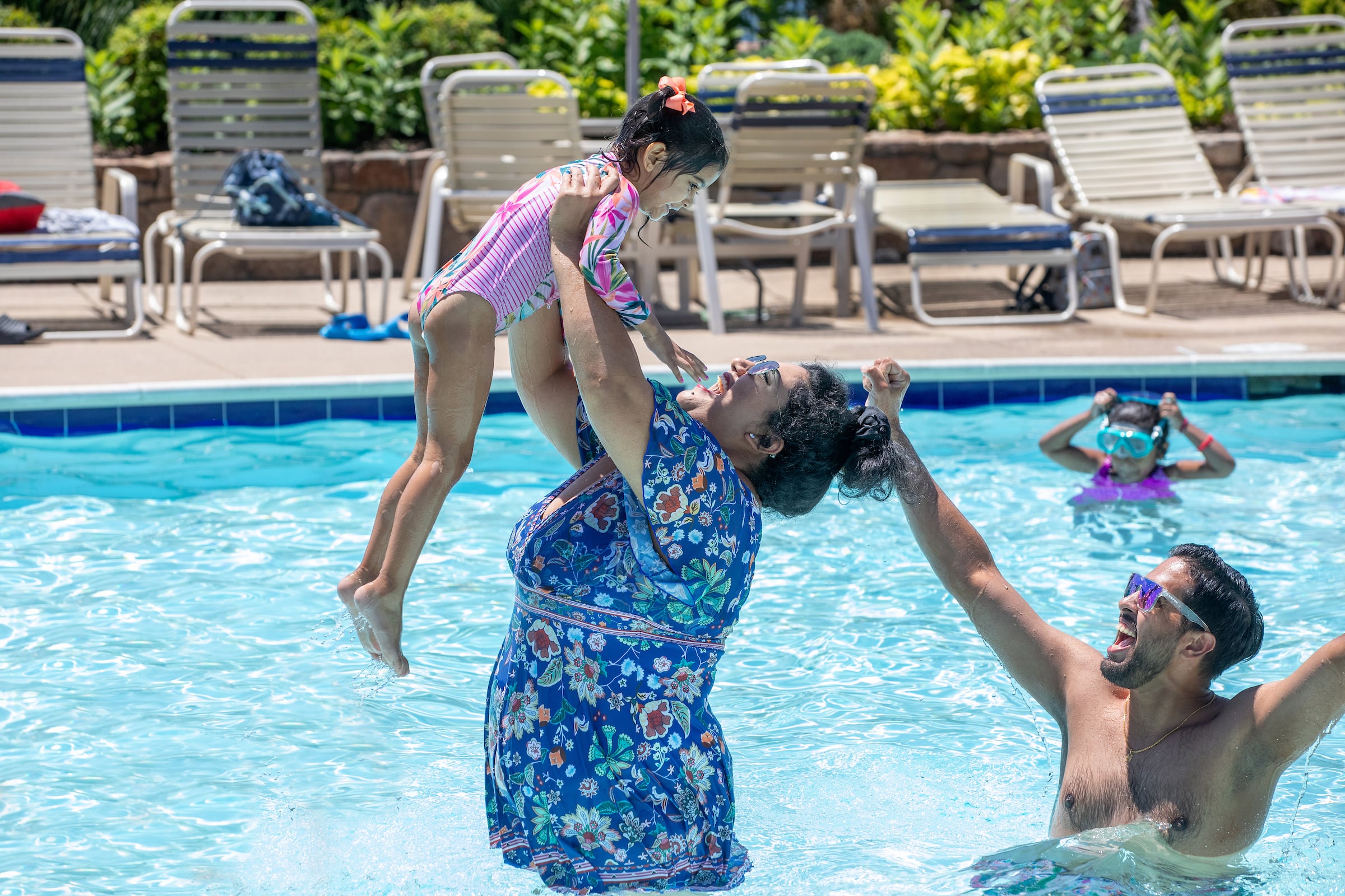 Family in pool