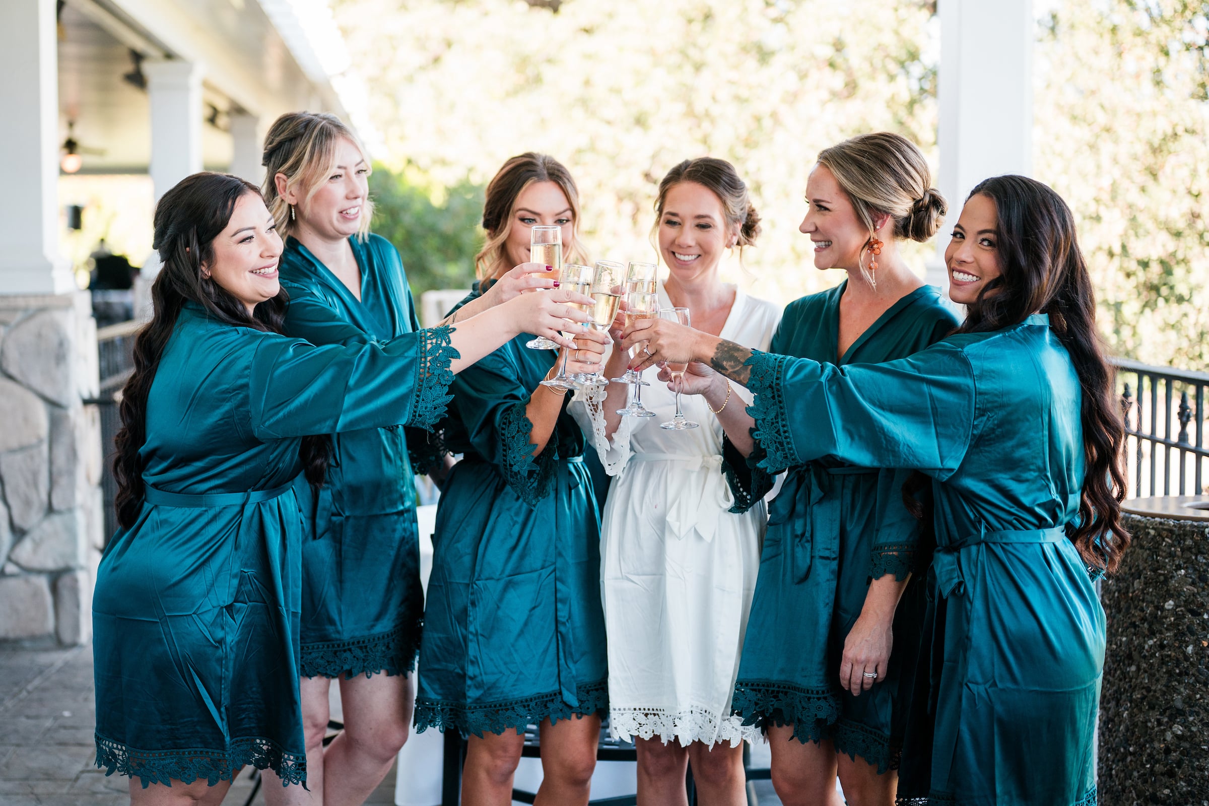 bride and bridesmaids cheering