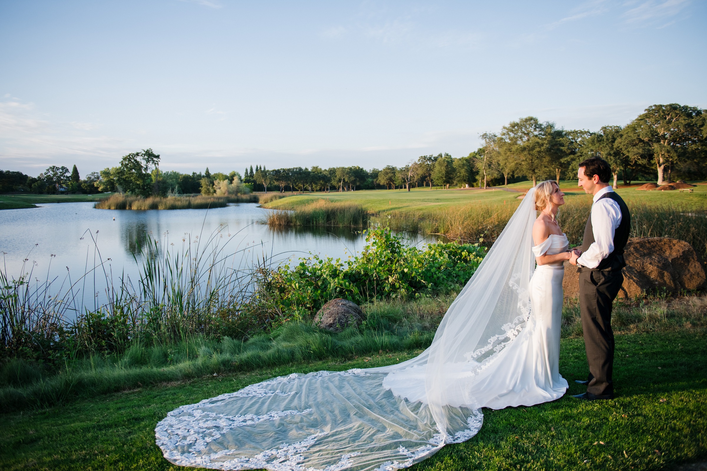bride and groom hugging
