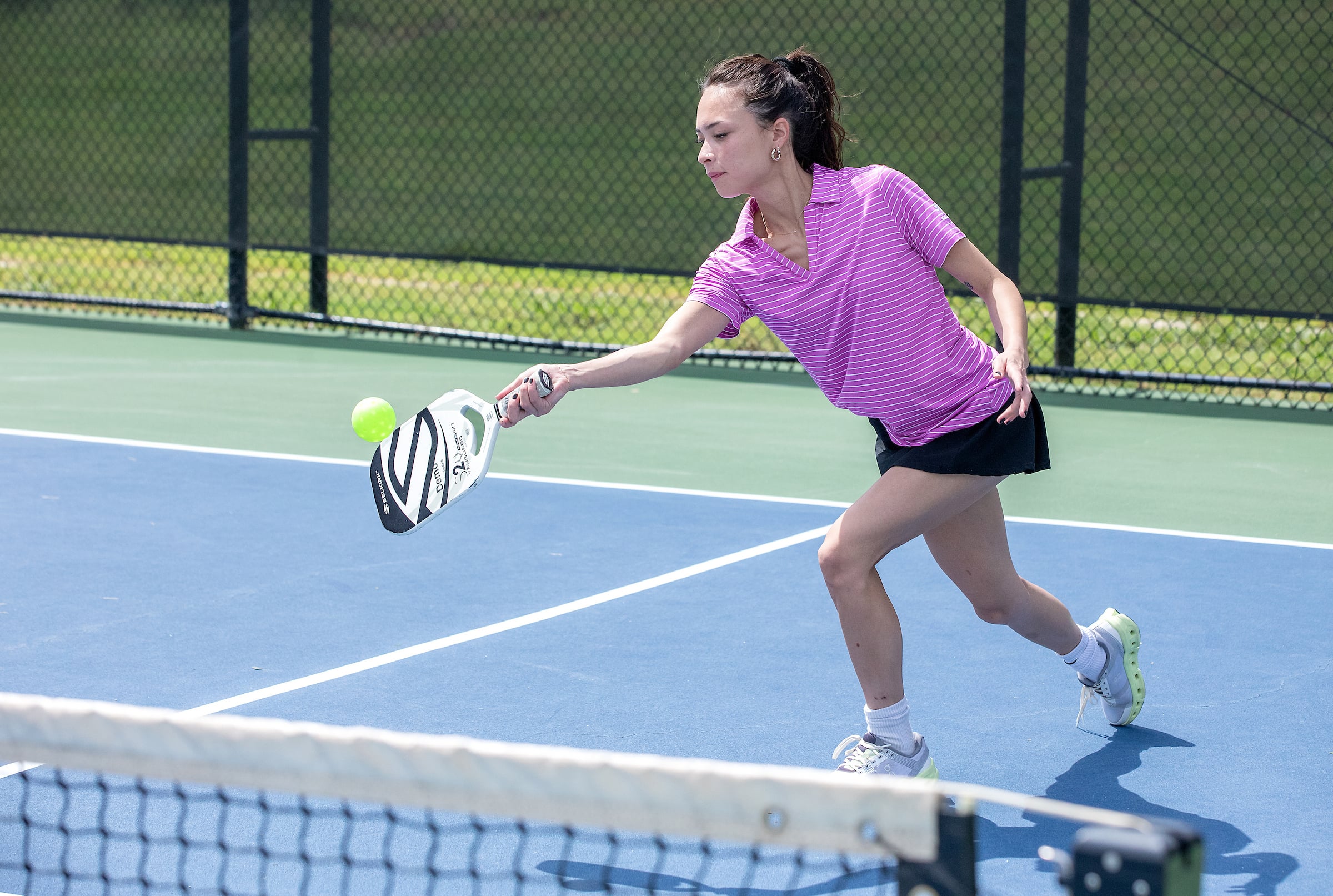 woman playing pickleball