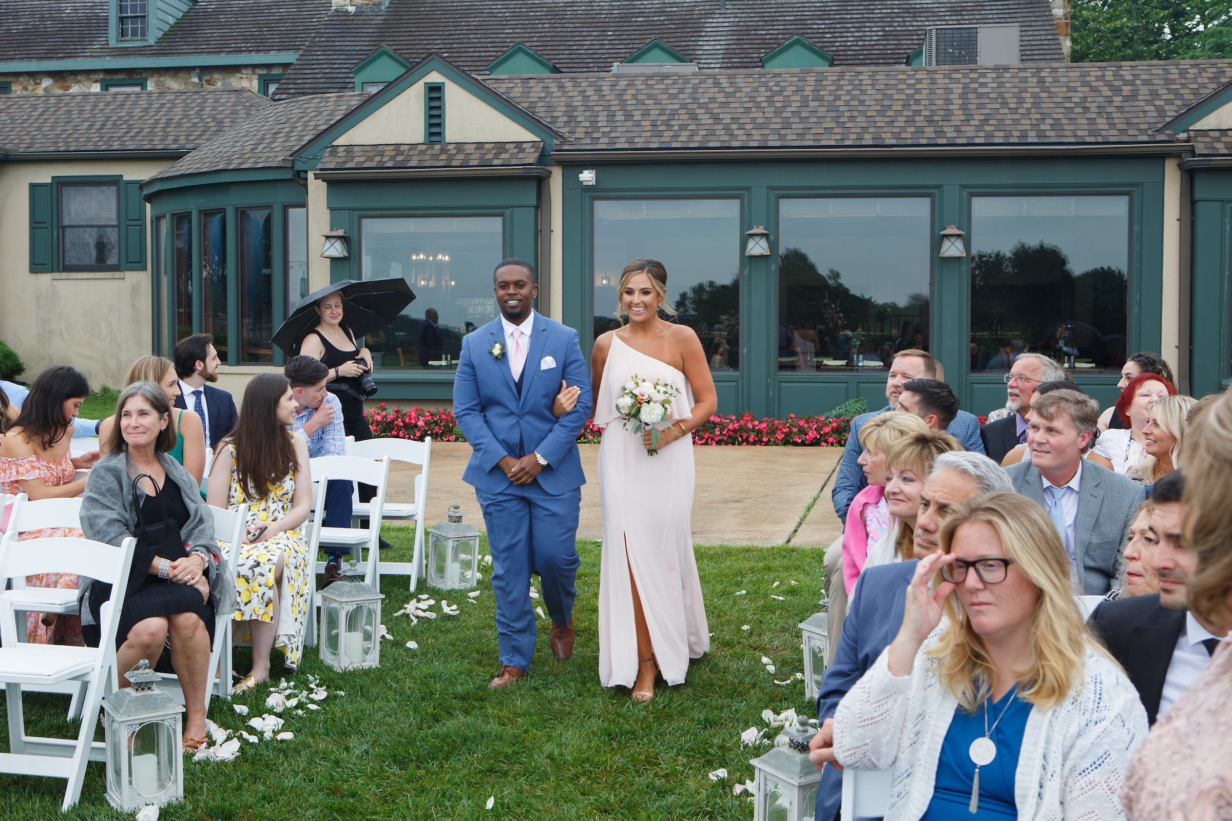 Groomsmen and bridesmaid walking down the aisle