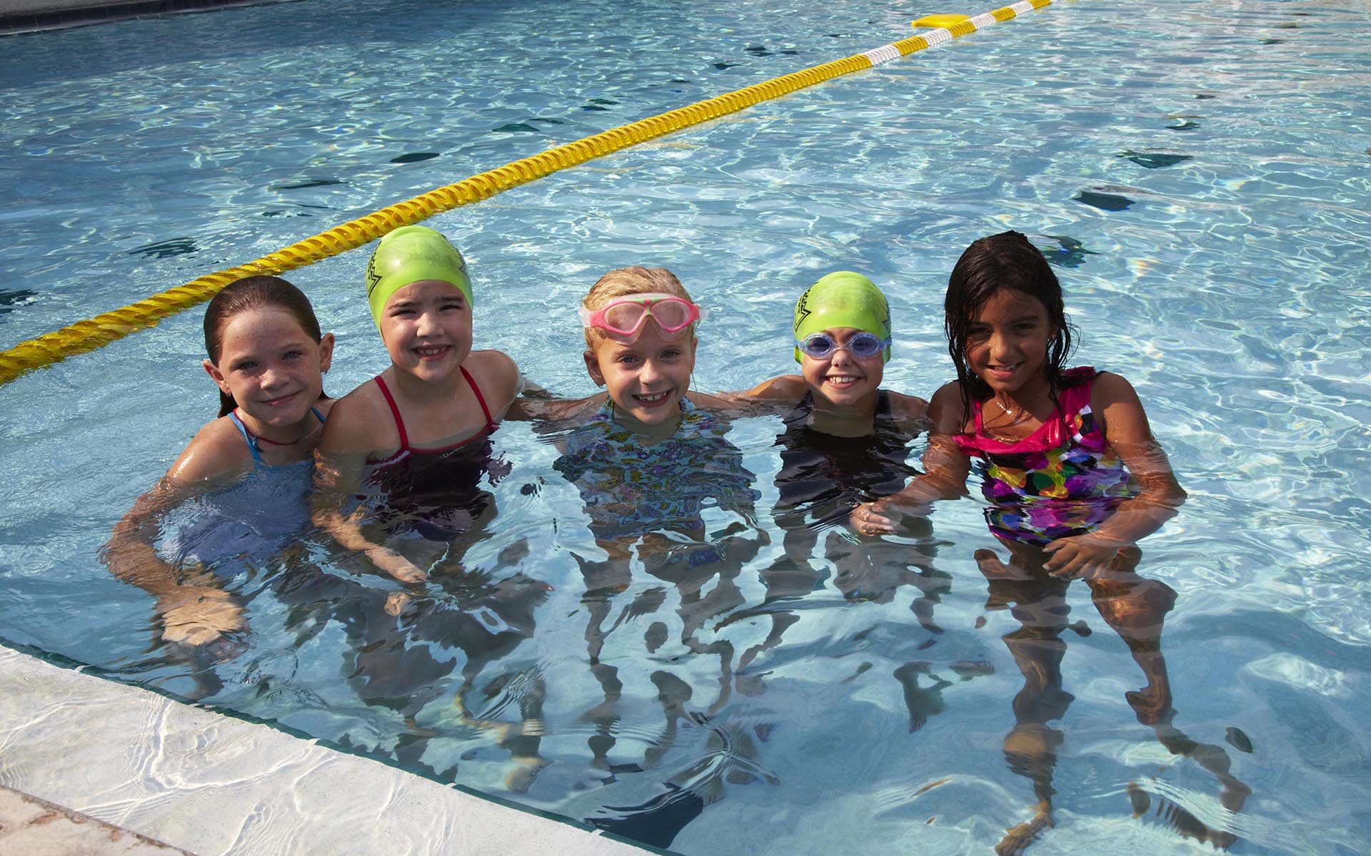 kids swimming in the pool