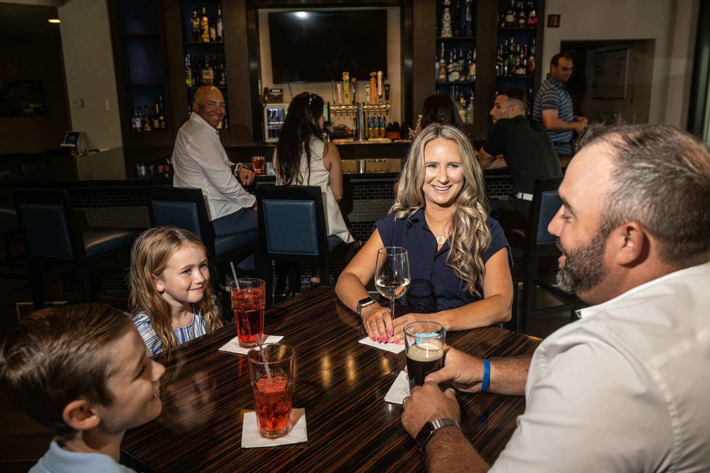 Family of four dining