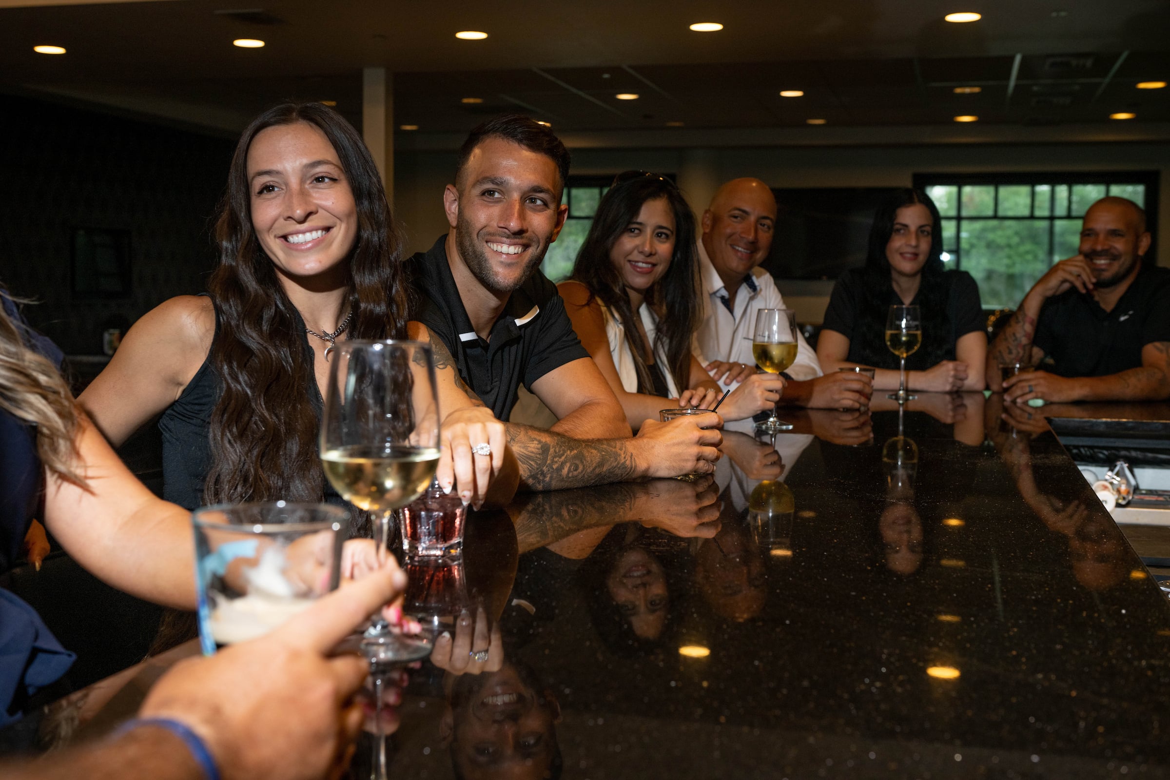 Members dining at a bar