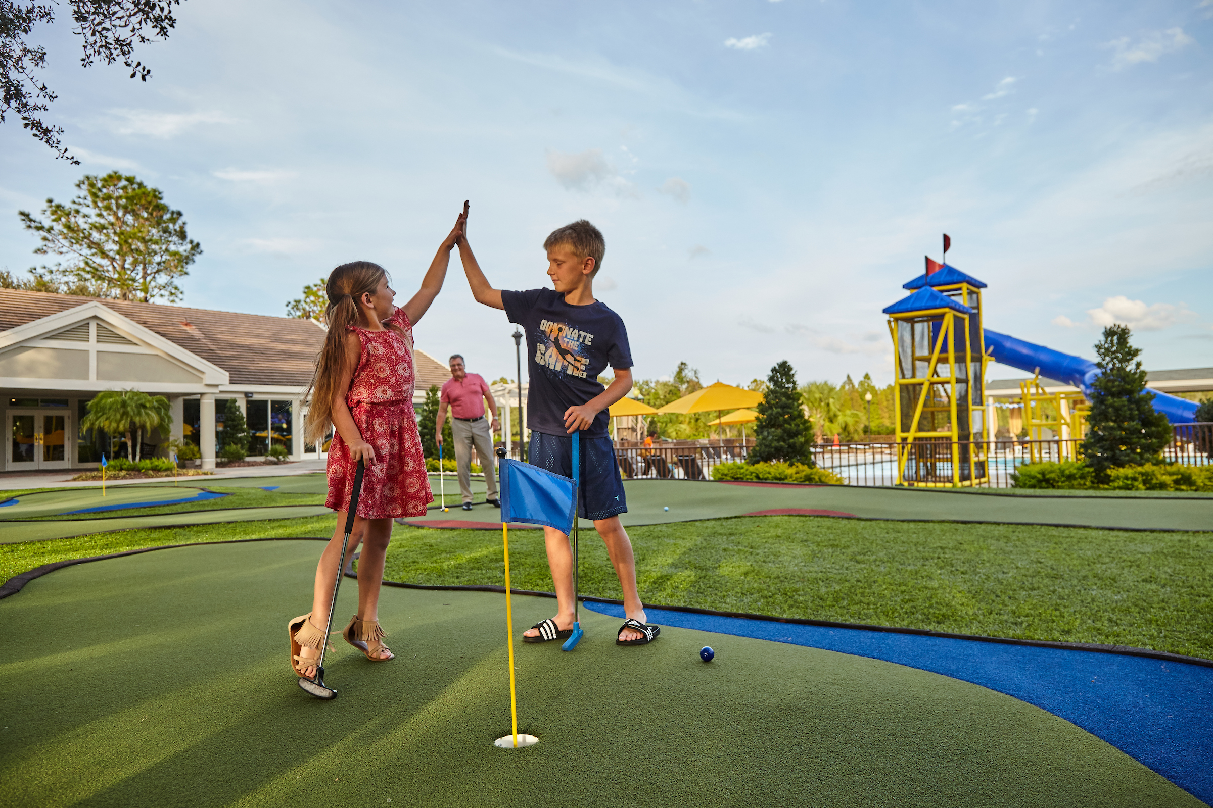 Children playing mini golf