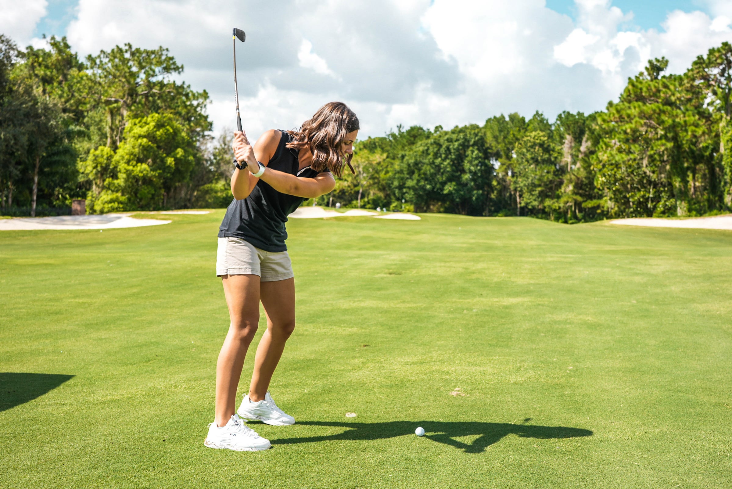 Woman playing golf