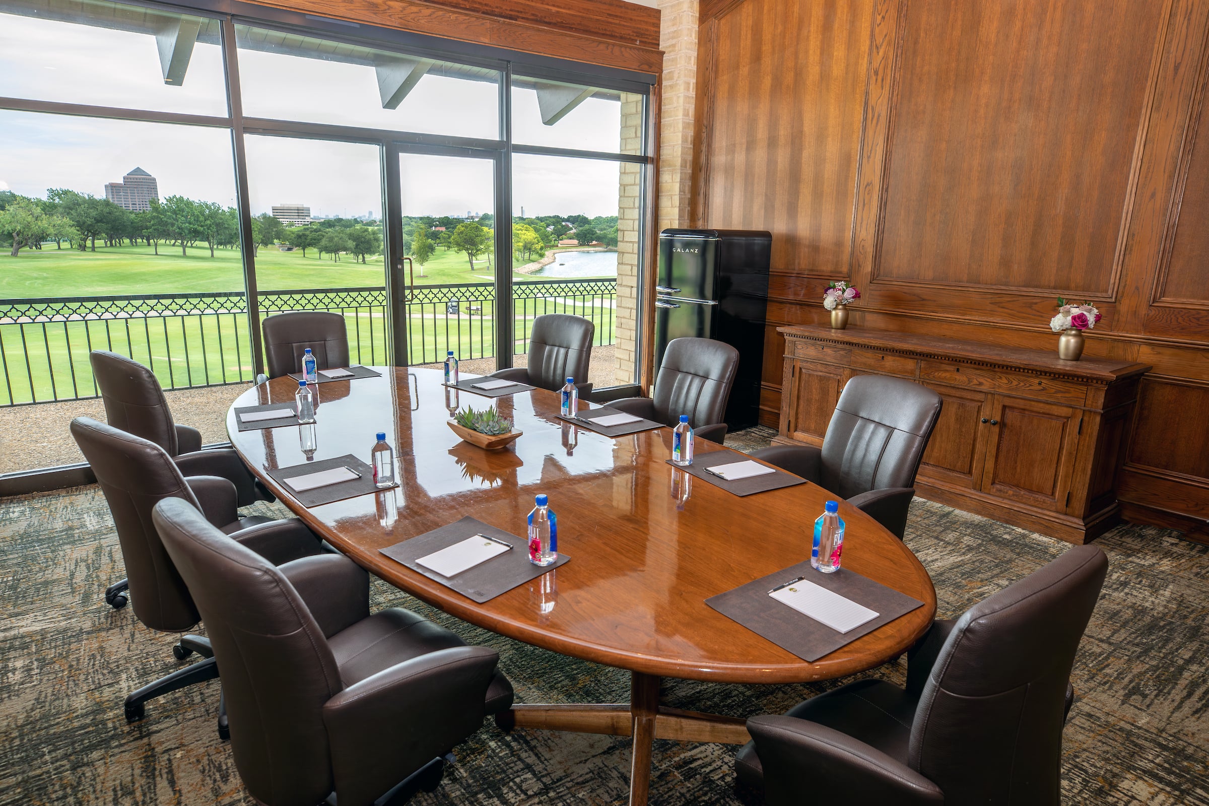 table and chairs set up for a meeting