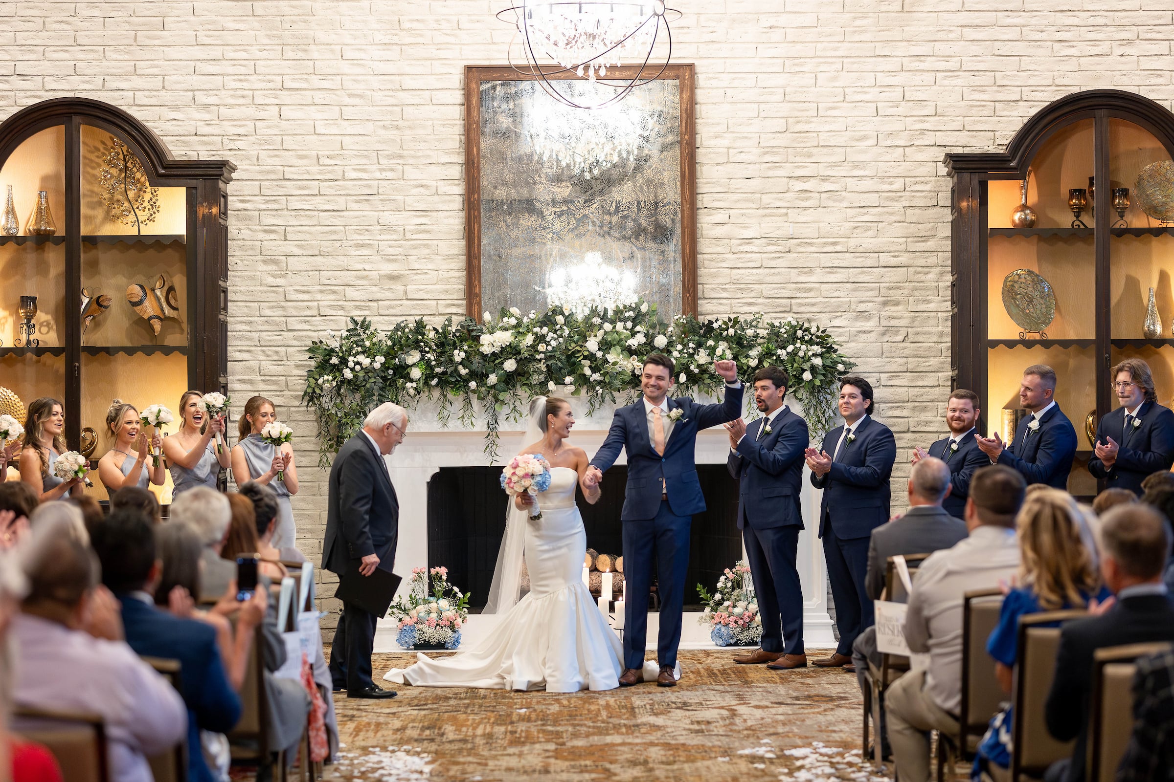 bride and groom standing at their wedding ceremony