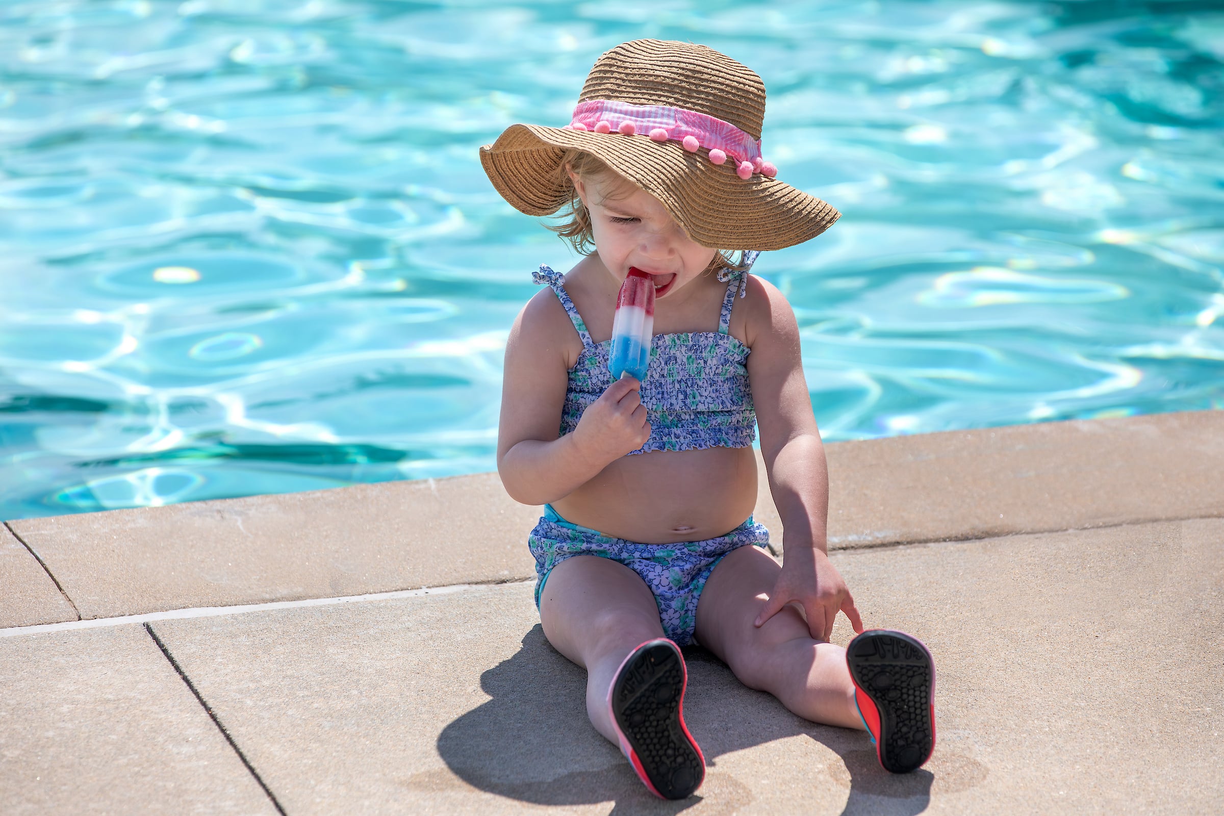 girl eating a popsicle