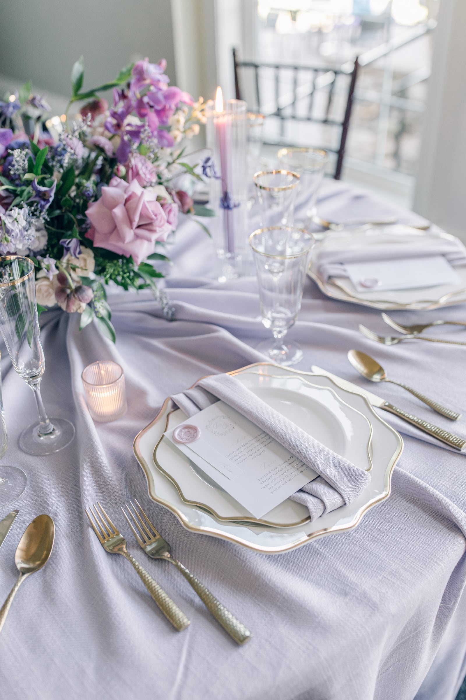 table and chairs set up for a wedding