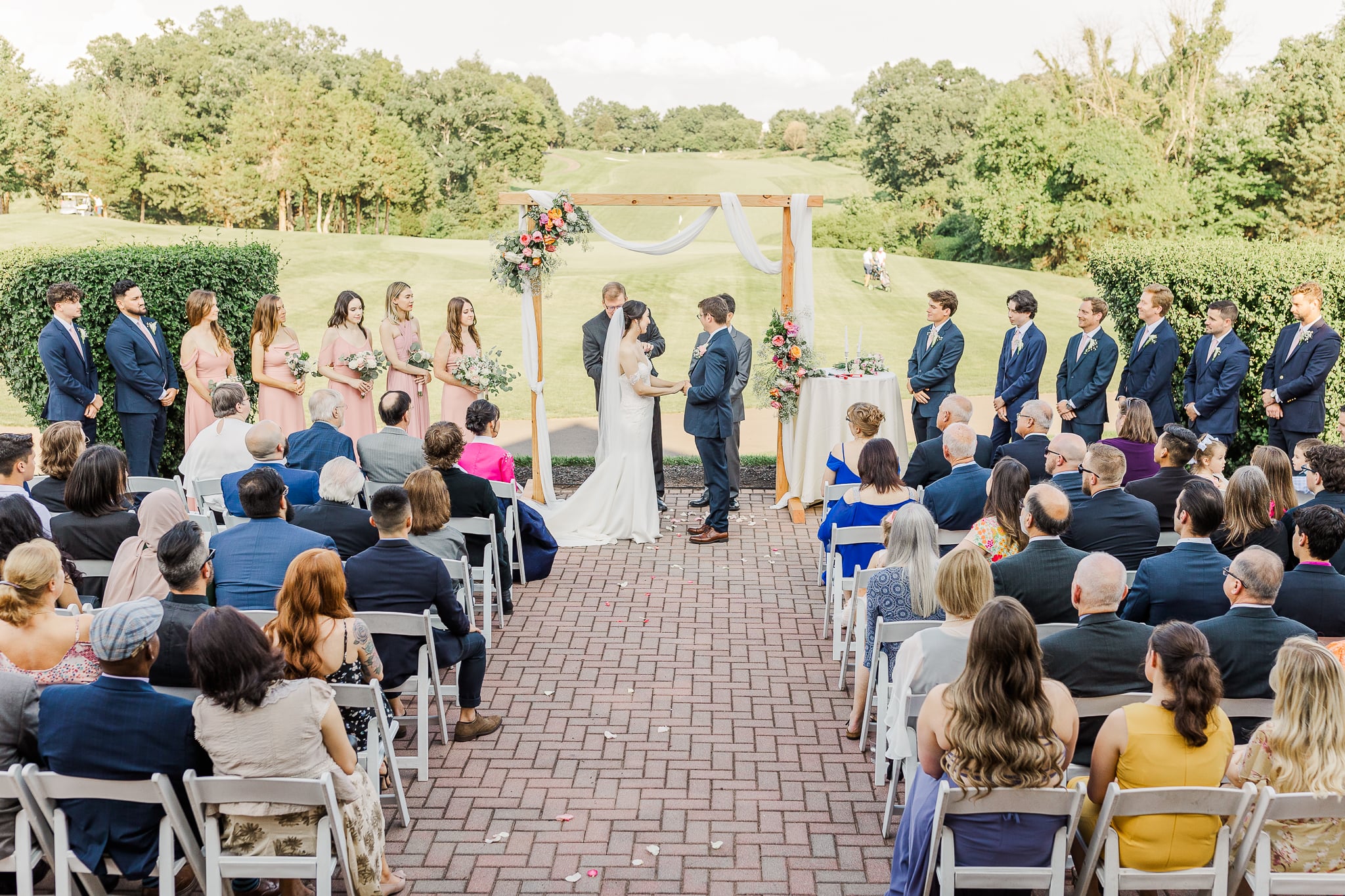 bride and groom getting married during ceremony