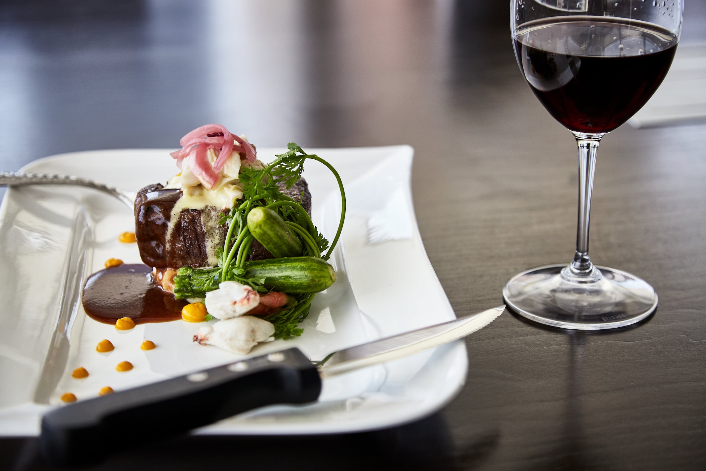 Plate of food & glass of wine