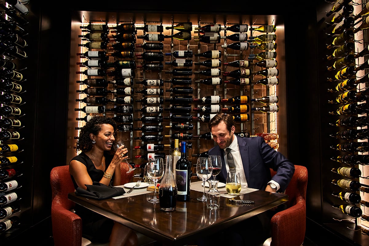 Couple dining in the Wine Cellar of Rivers Club
