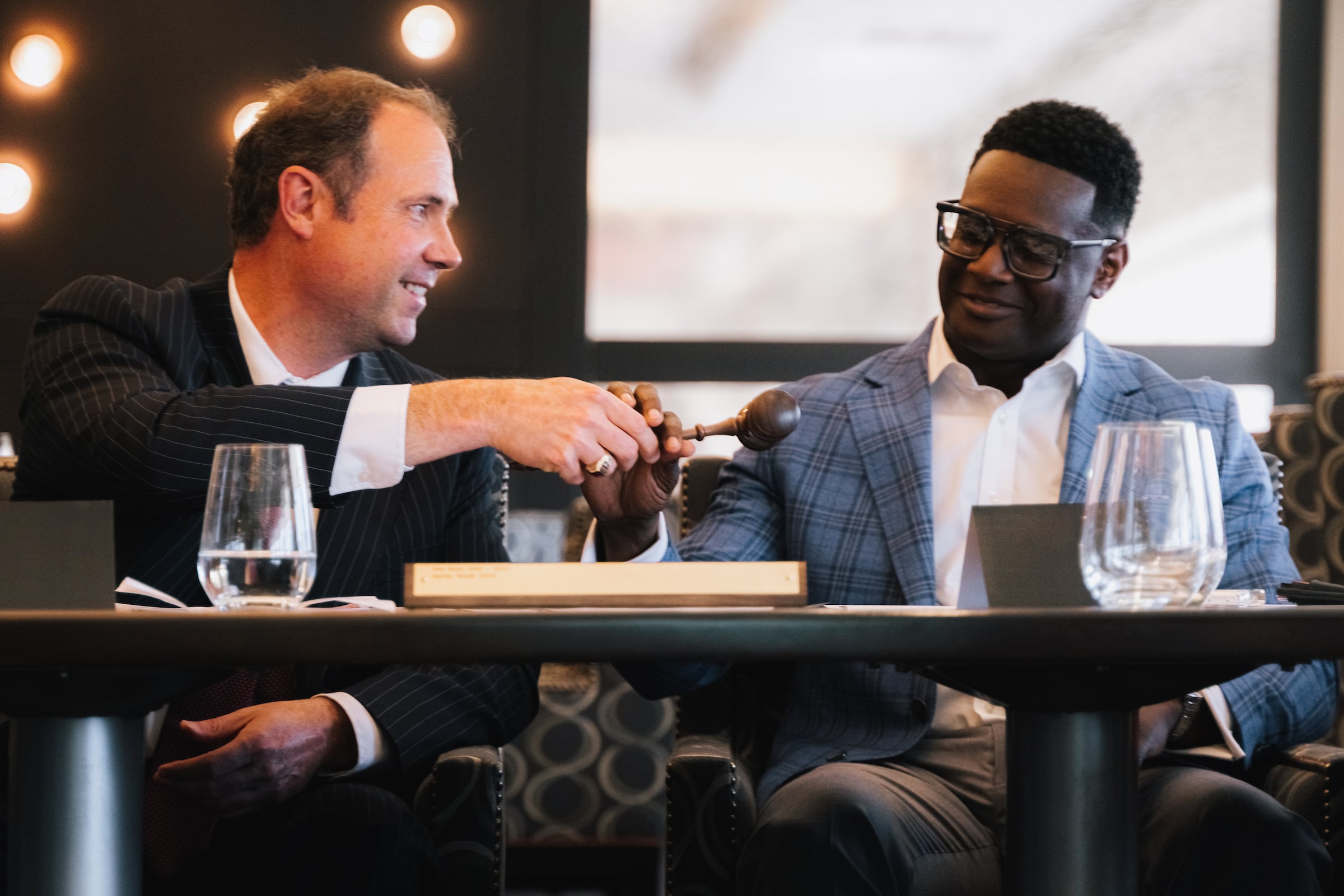 Two men at a Board Meeting