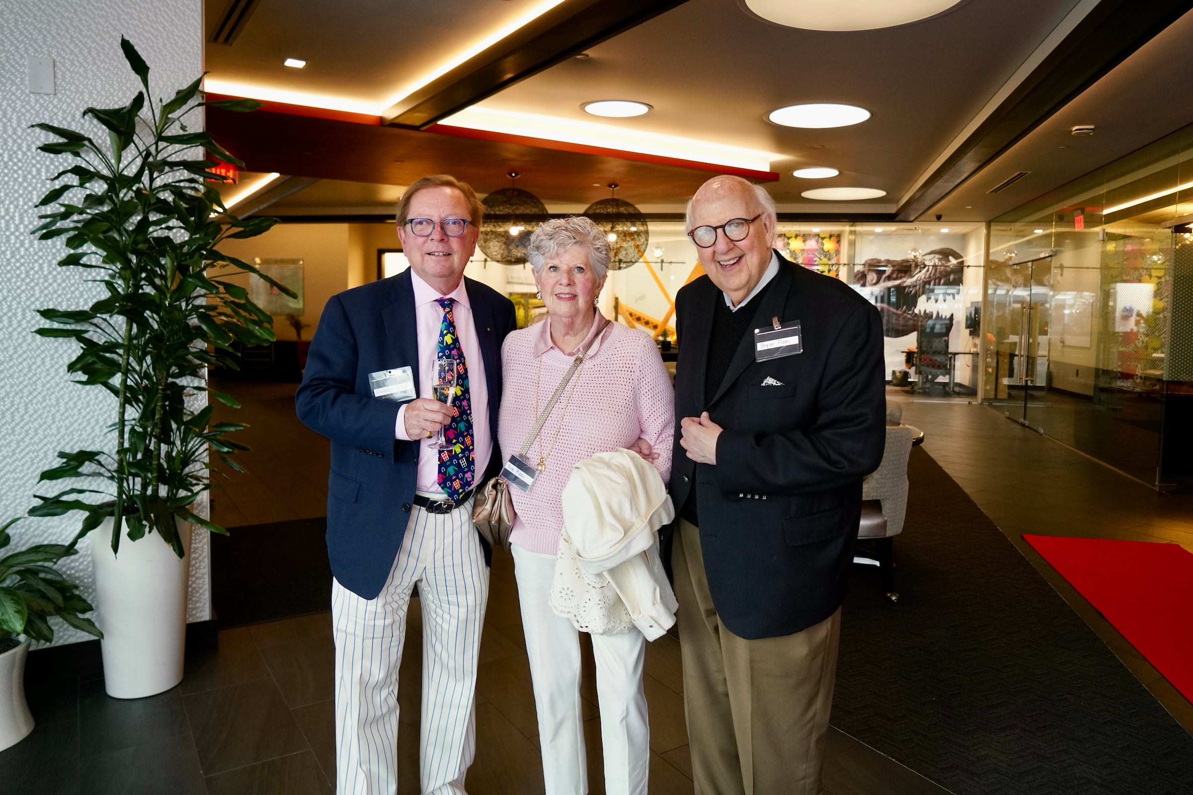 Two elderly men & one elderly woman who are Legacy Members of Rivers Club
