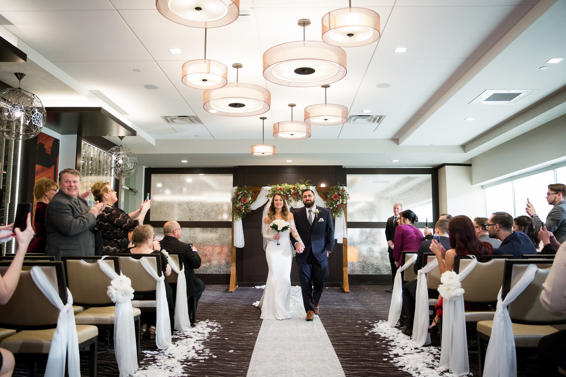 Bride & Groom walking down the isle after ceremony