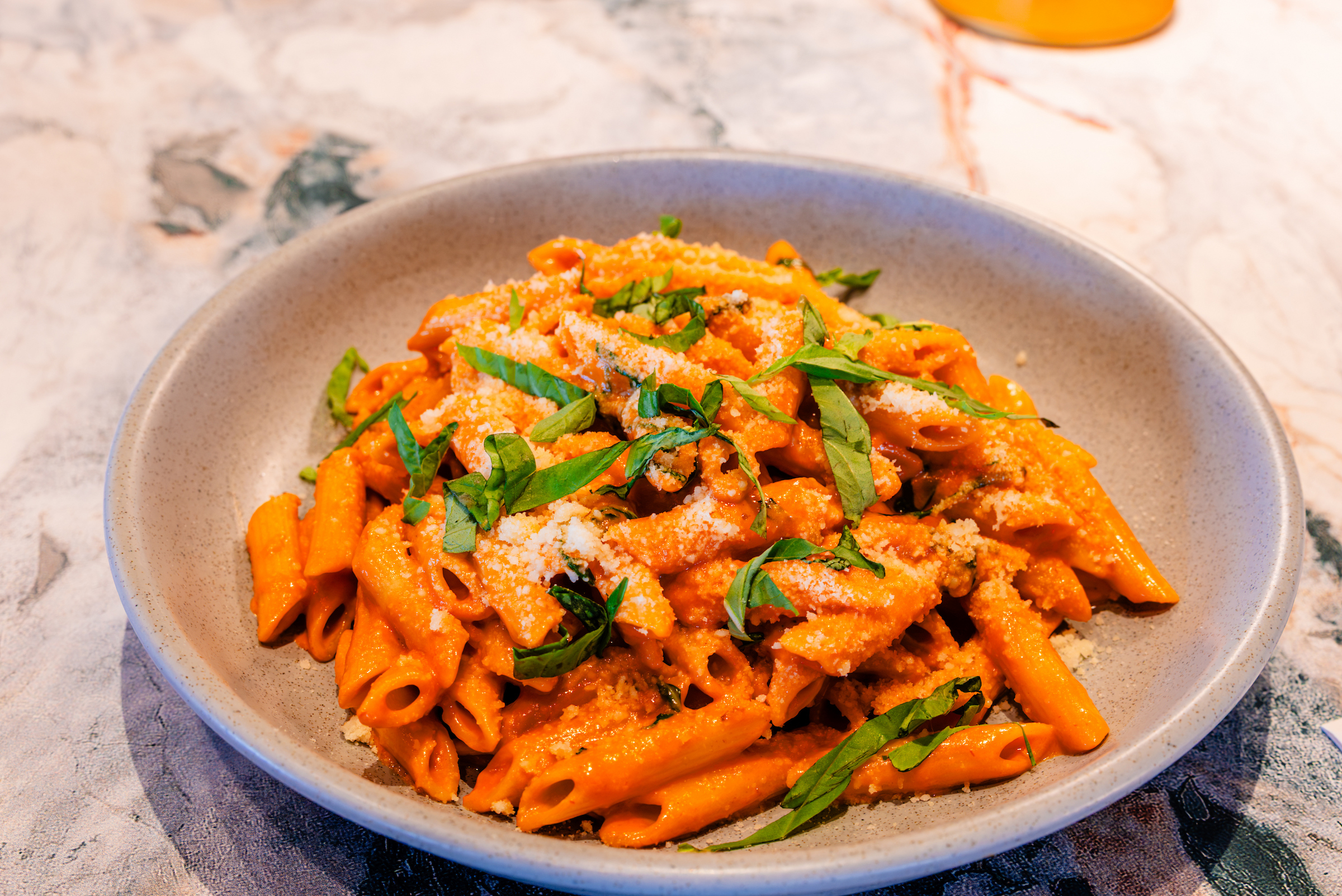 penne alla vodka sauce with basil and parmesan