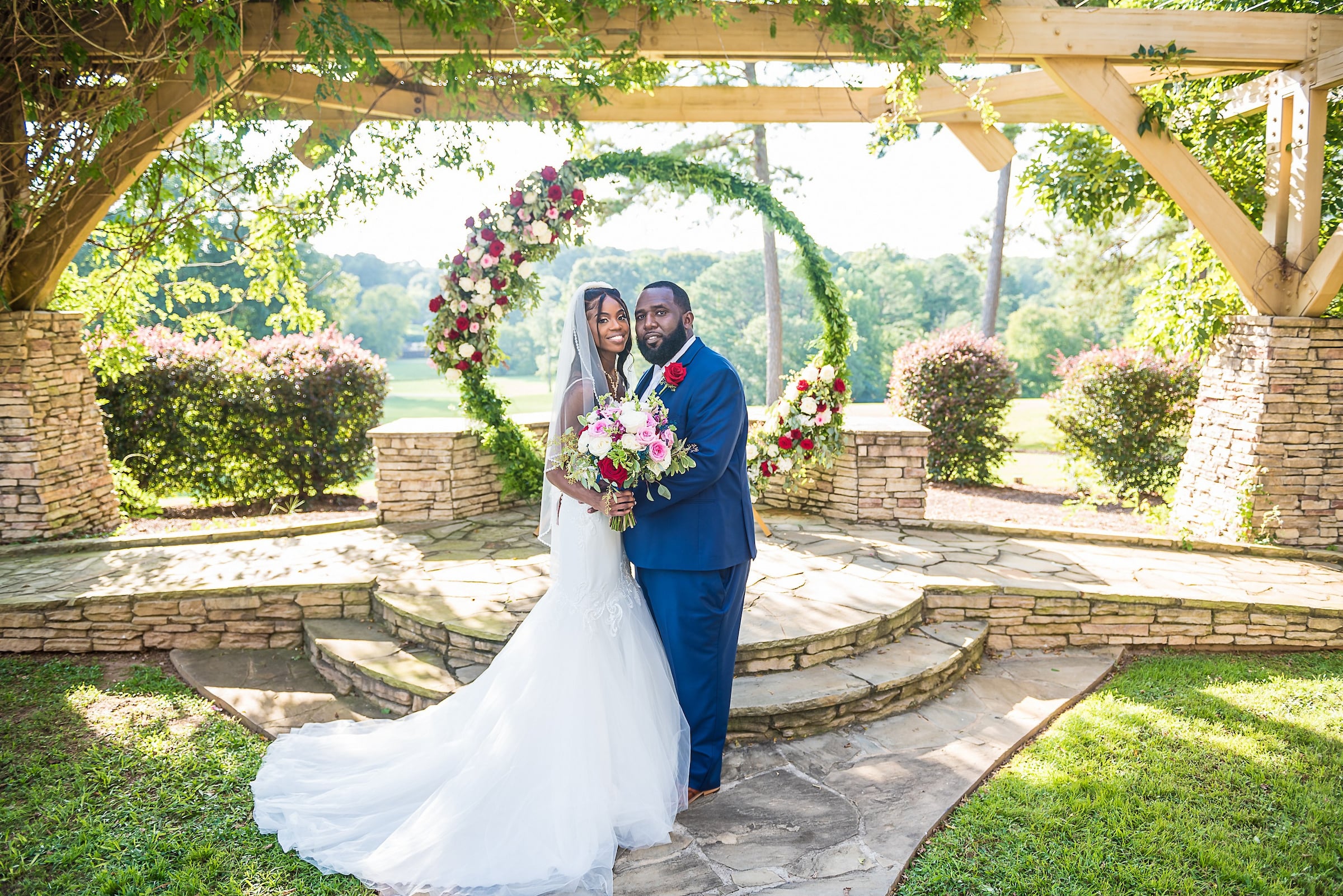 bride and groom in front of altar