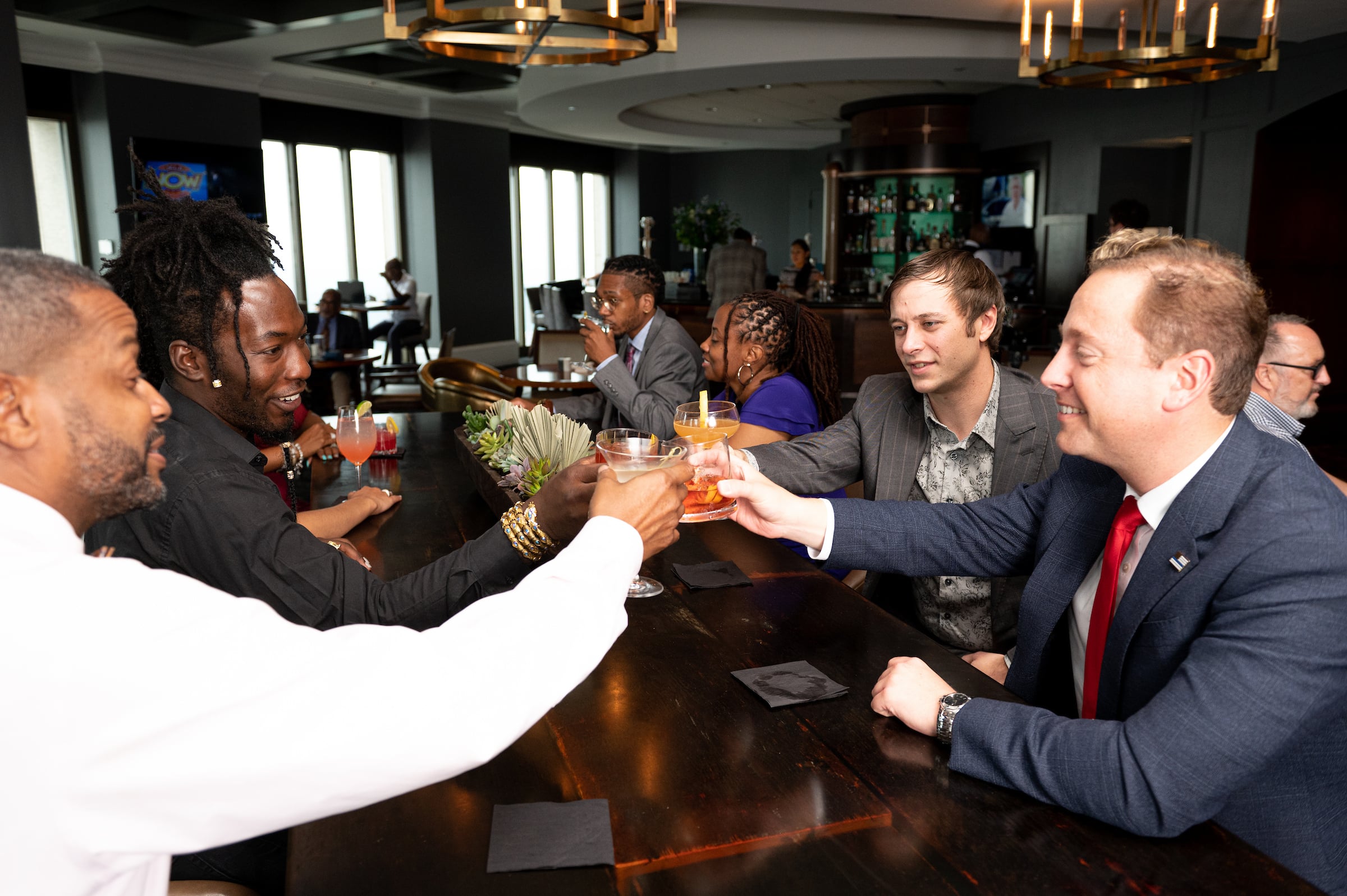 Men & women drinking in The Commerce Club Atlanta bar