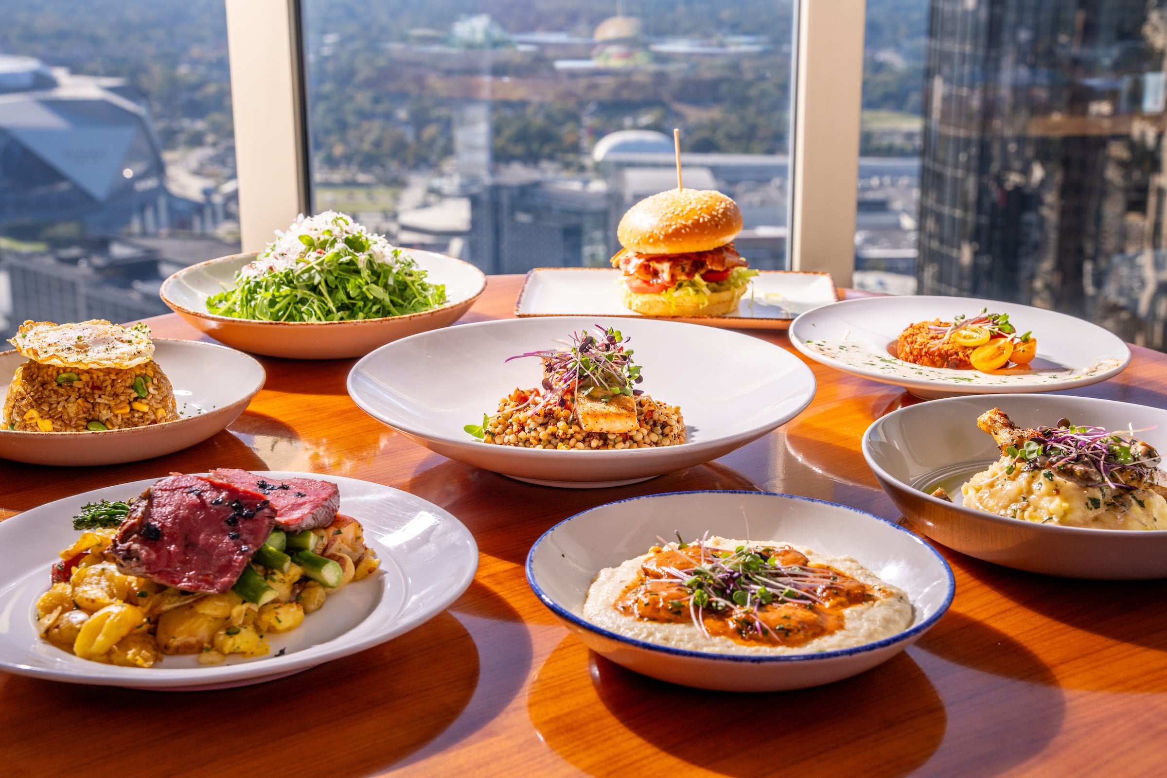 Seven plates of food displayed