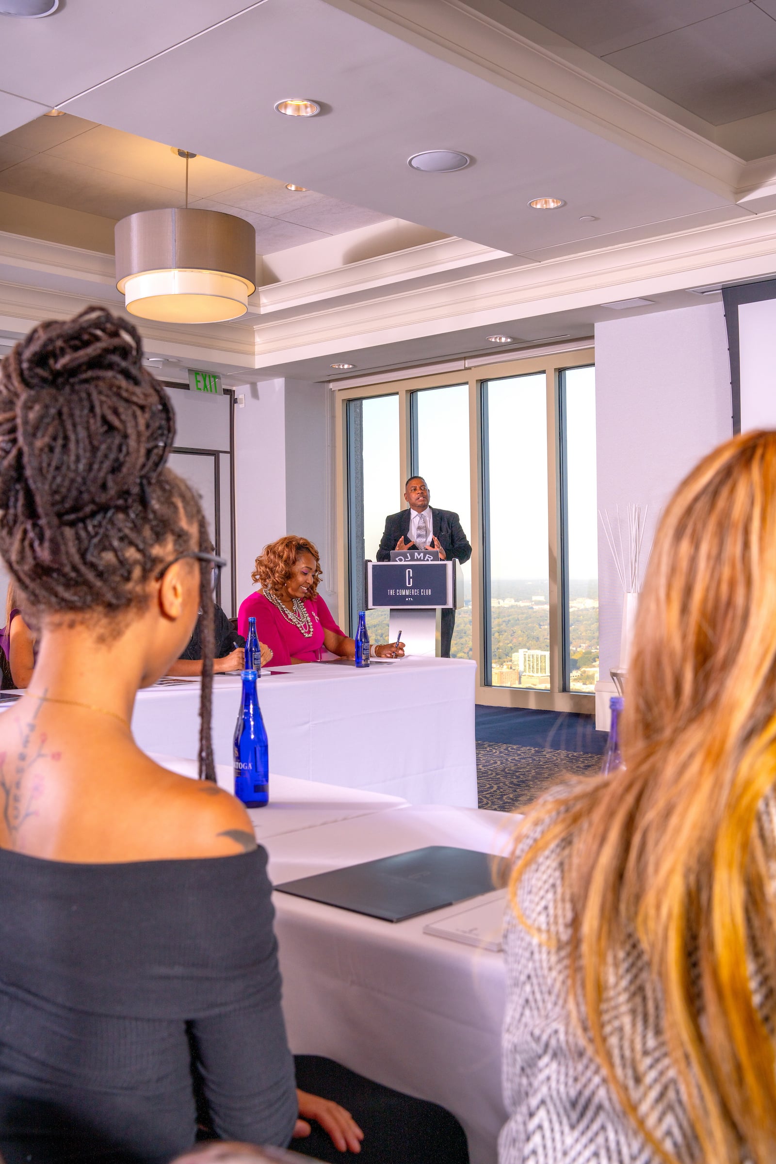 Man speaking at a meeting