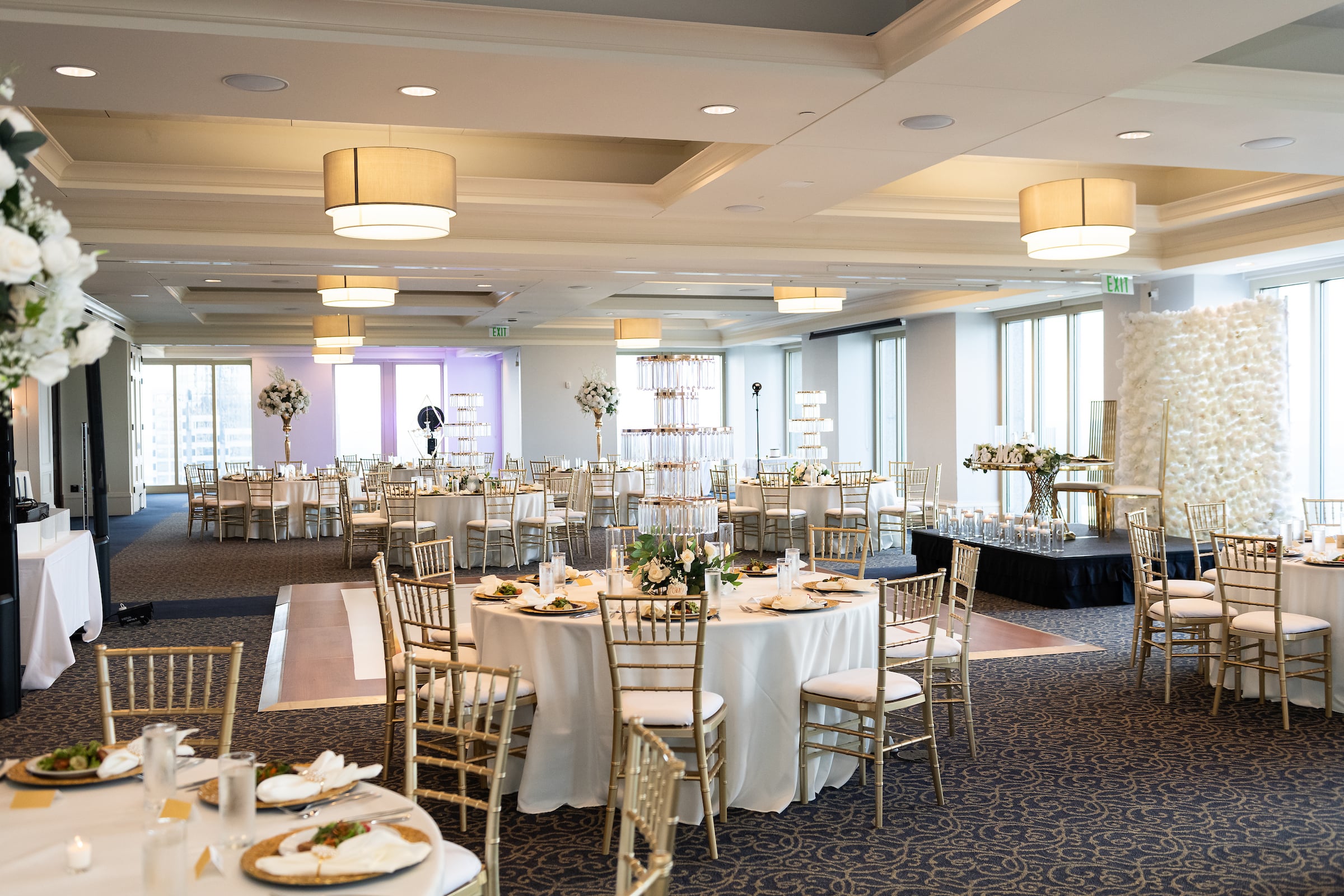 Ballroom with sweetheart table on stage at The Commerce Club Atlanta